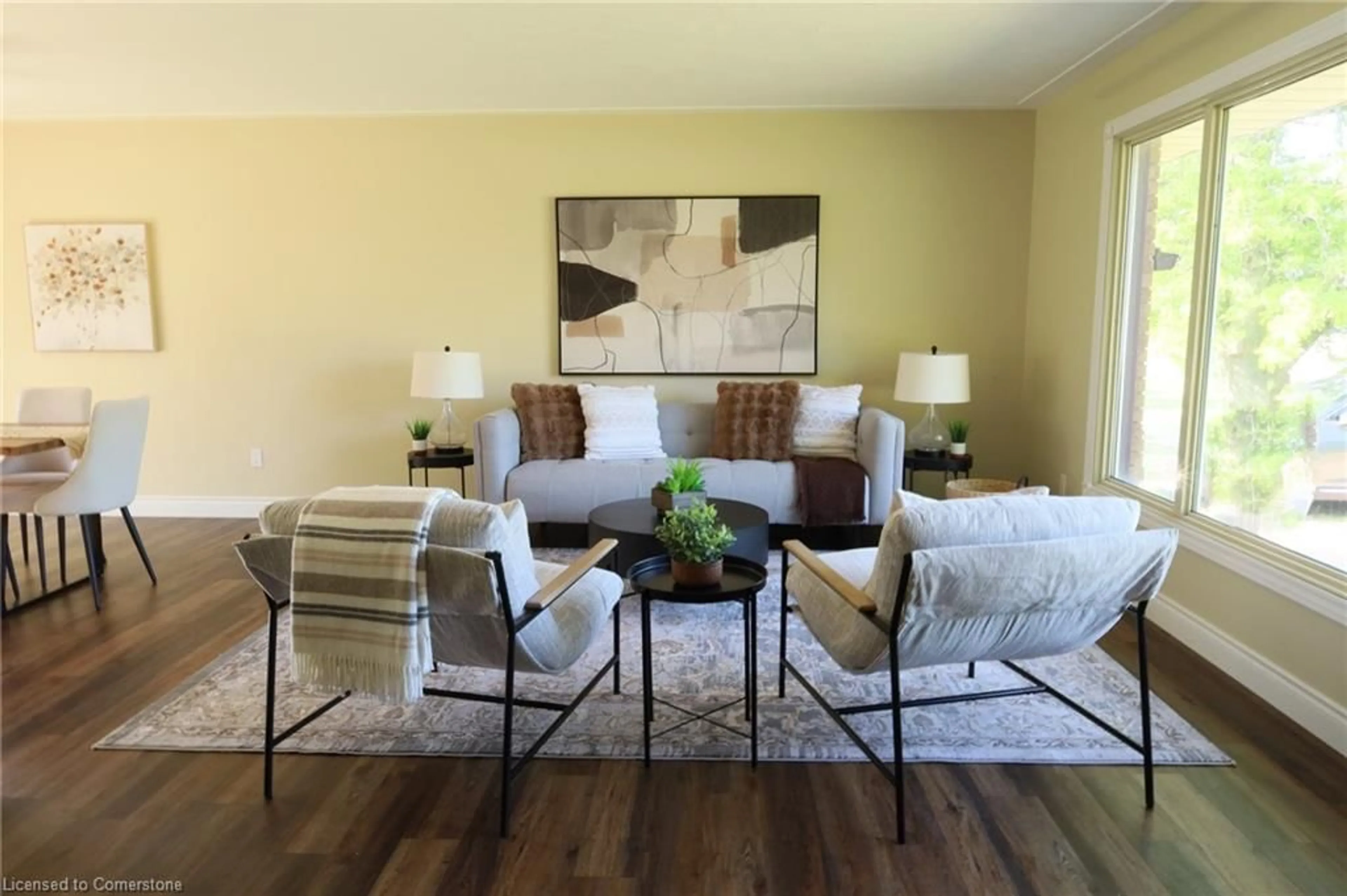 Living room with furniture, wood/laminate floor for 539 Alberton Rd, Ancaster Ontario L0R 1A0