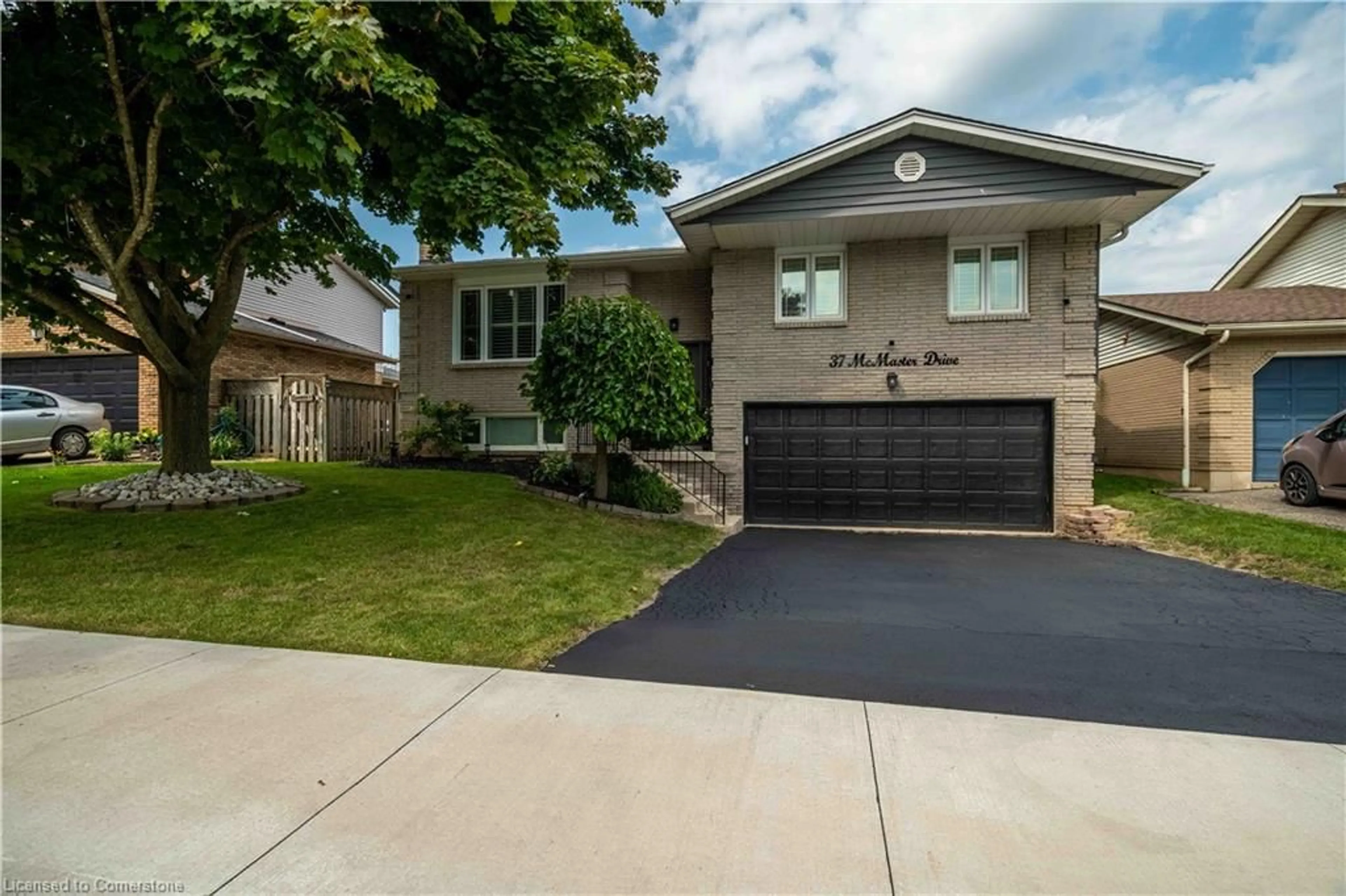 Home with brick exterior material, street for 37 Mcmaster Dr, Caledonia Ontario N3W 1H4