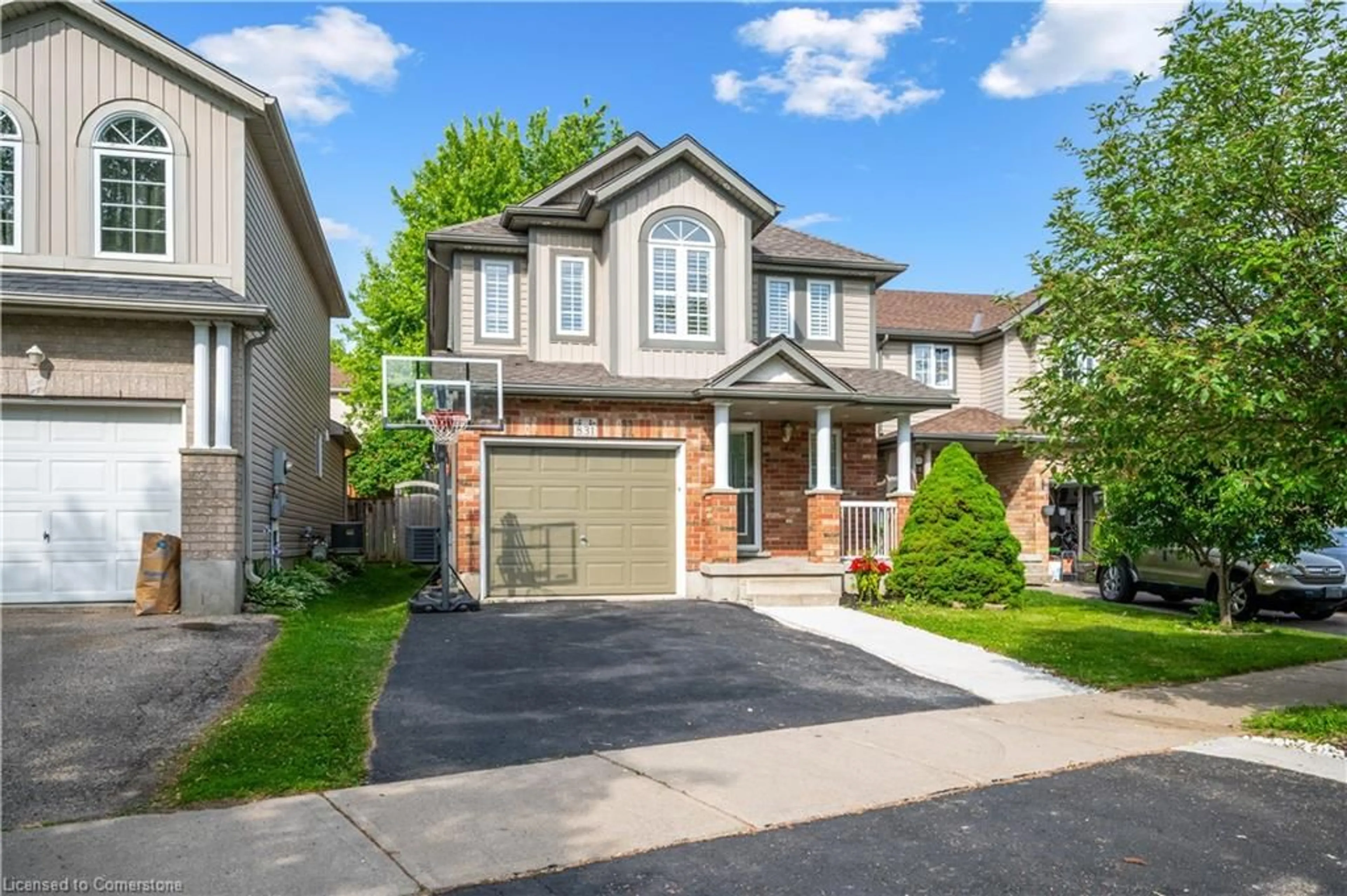 Home with brick exterior material, street for 831 Whitecap Ave, Waterloo Ontario N2K 4L4
