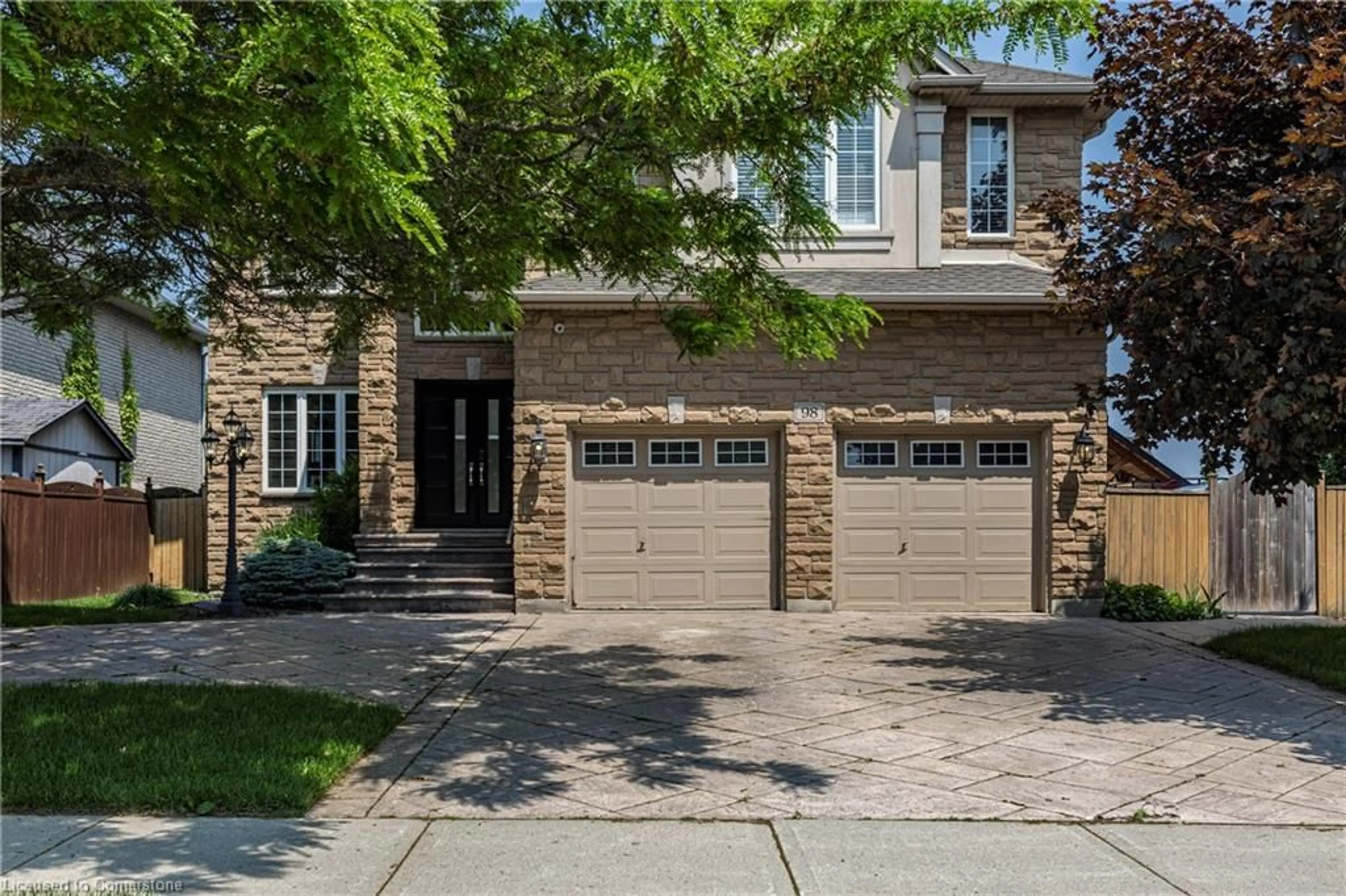 Home with brick exterior material, street for 98 Stonehenge Dr, Ancaster Ontario L9K 1M1