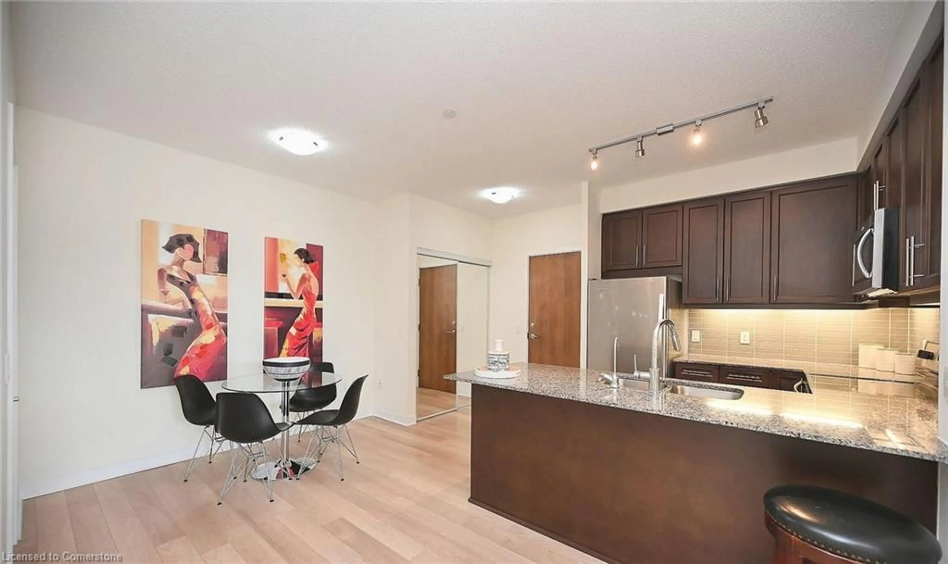 Open concept kitchen, wood/laminate floor for 3975 Grand Park Dr #109, Mississauga Ontario L5B 0K4
