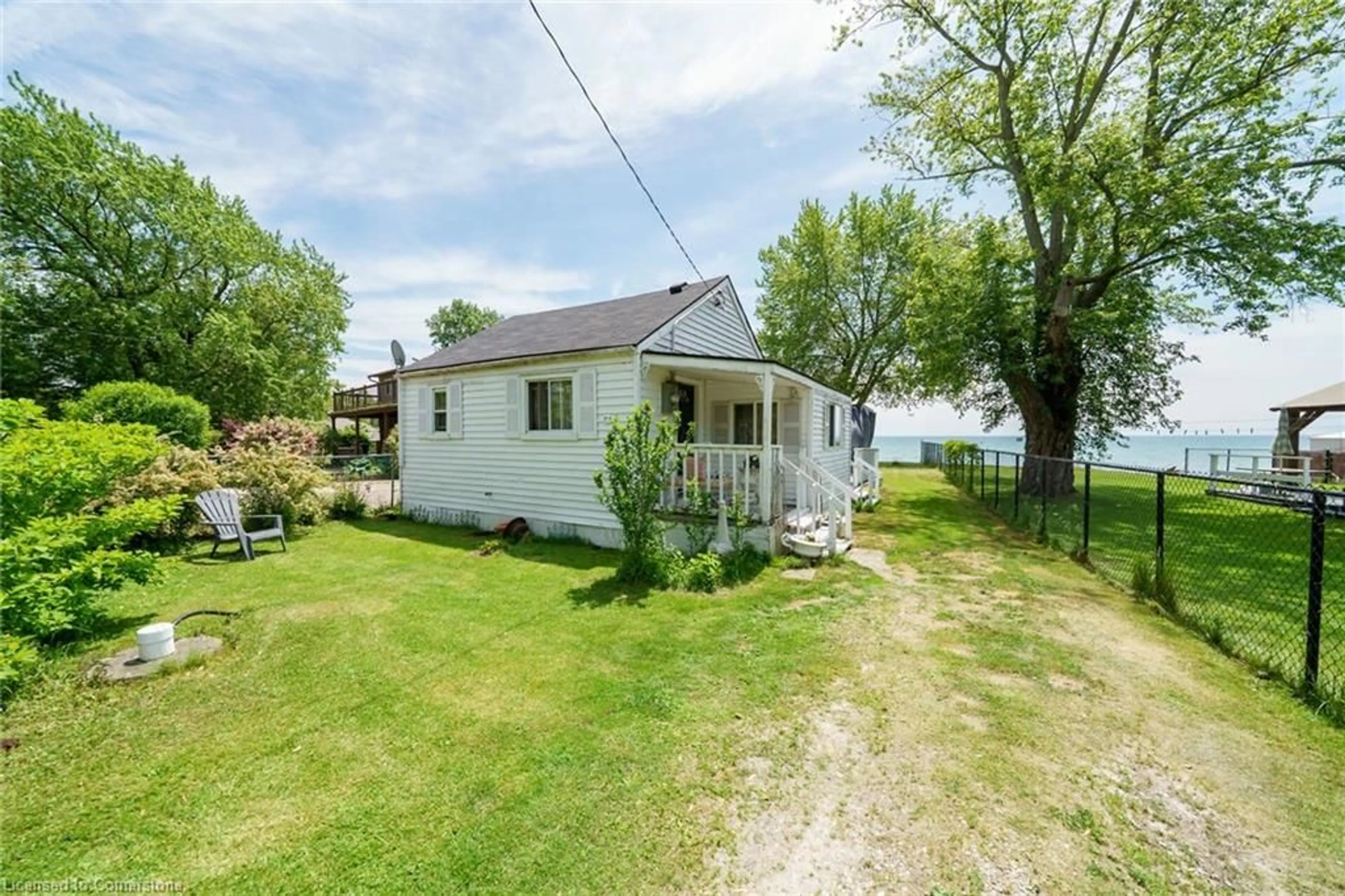 A pic from outside/outdoor area/front of a property/back of a property/a pic from drone, water/lake/river/ocean view for 976 Lakeshore Rd, Selkirk Ontario N0A 1P0