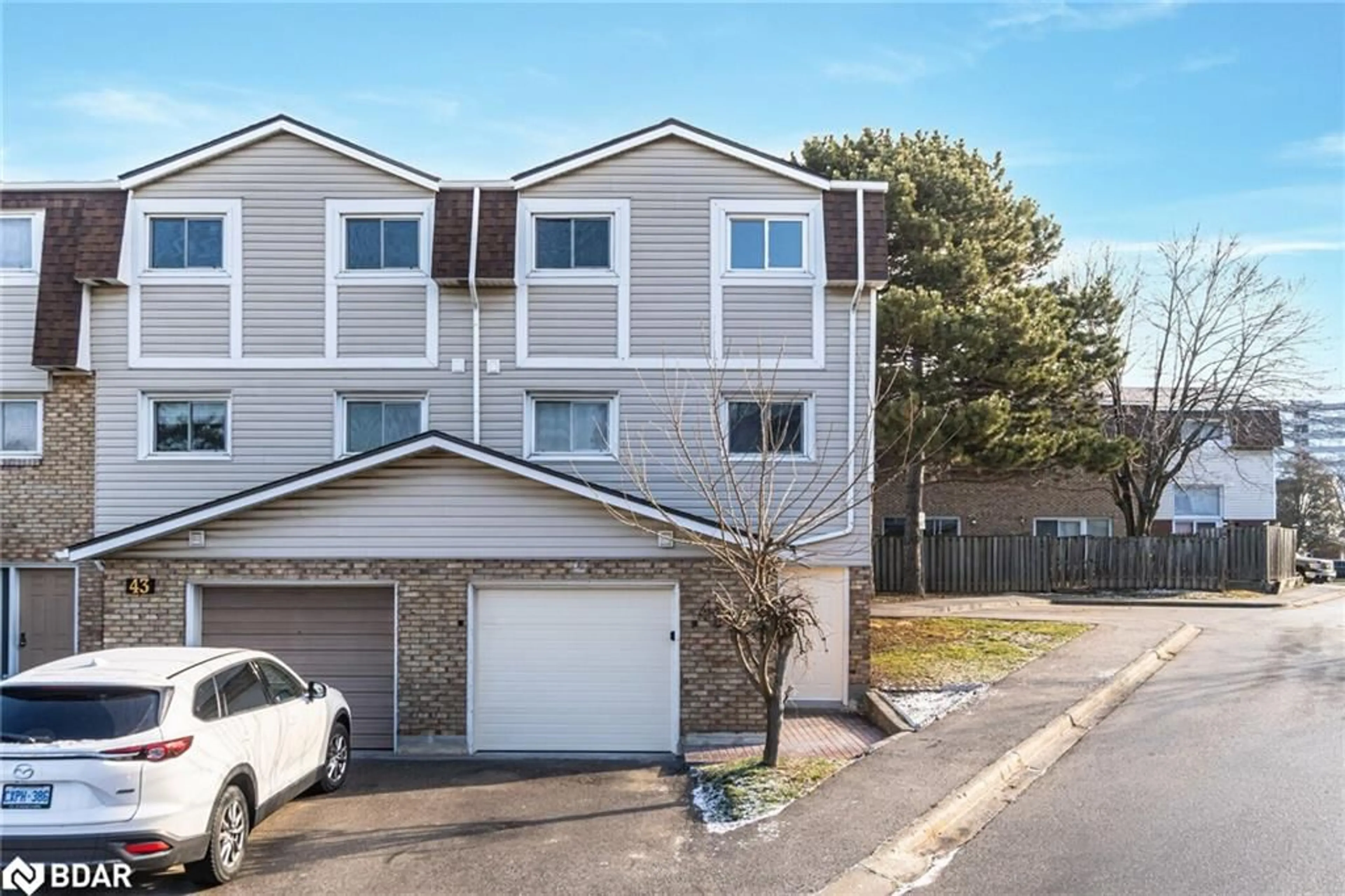 A pic from outside/outdoor area/front of a property/back of a property/a pic from drone, street for 11 Harrisford St #42, Hamilton Ontario L8K 8L7