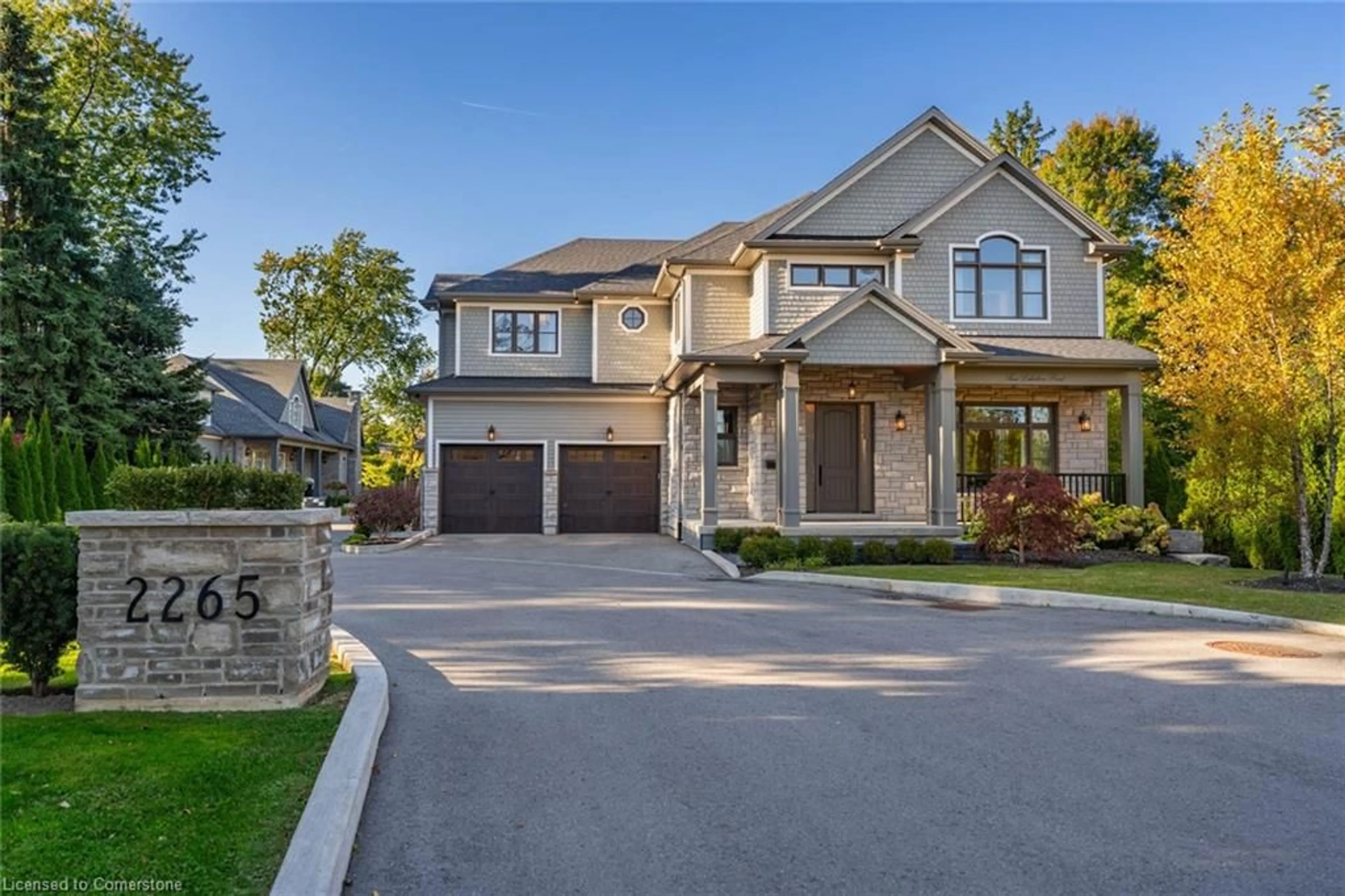 Home with brick exterior material, street for 2265 Lakeshore Rd #3, Burlington Ontario L7R 1B1