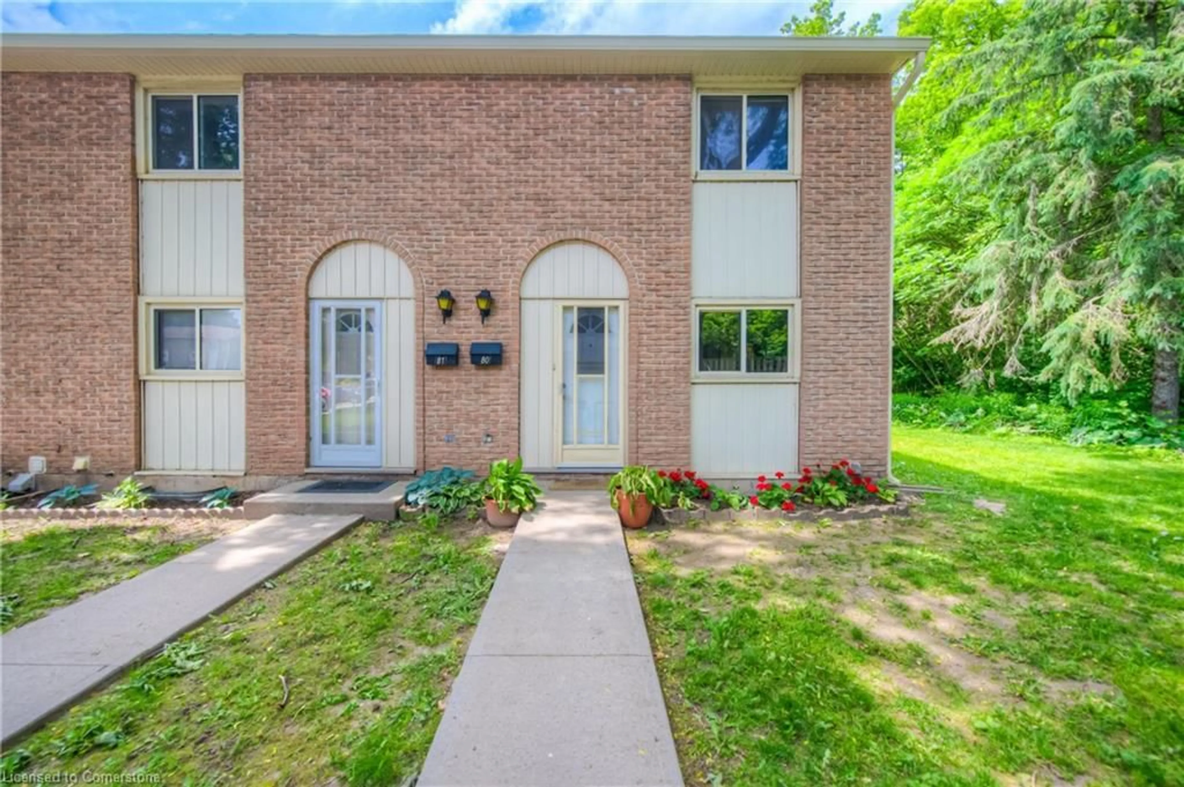Home with brick exterior material, street for 165 Green Valley Dr #80, Kitchener Ontario N2P 1K3