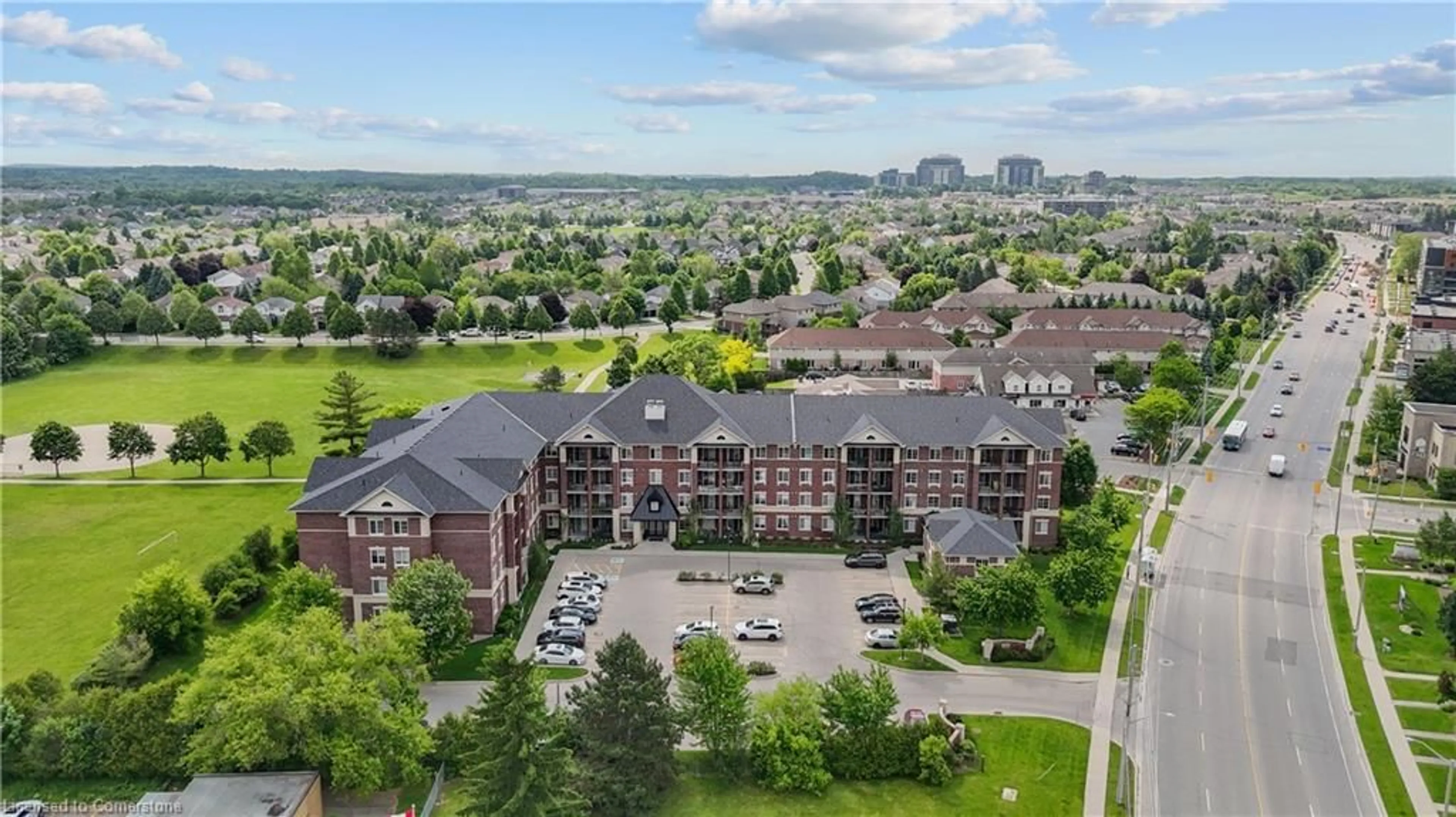 A pic from outside/outdoor area/front of a property/back of a property/a pic from drone, unknown for 1440 Gordon St #317, Guelph Ontario N1L 1C8
