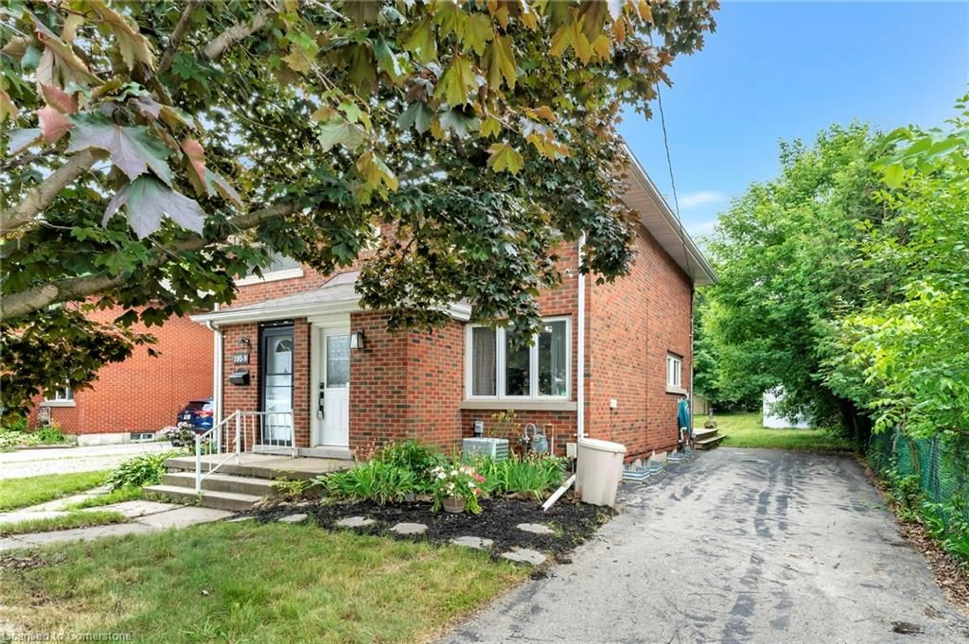 Home with brick exterior material, street for 195 Erb St #A, Waterloo Ontario N2J 1M7