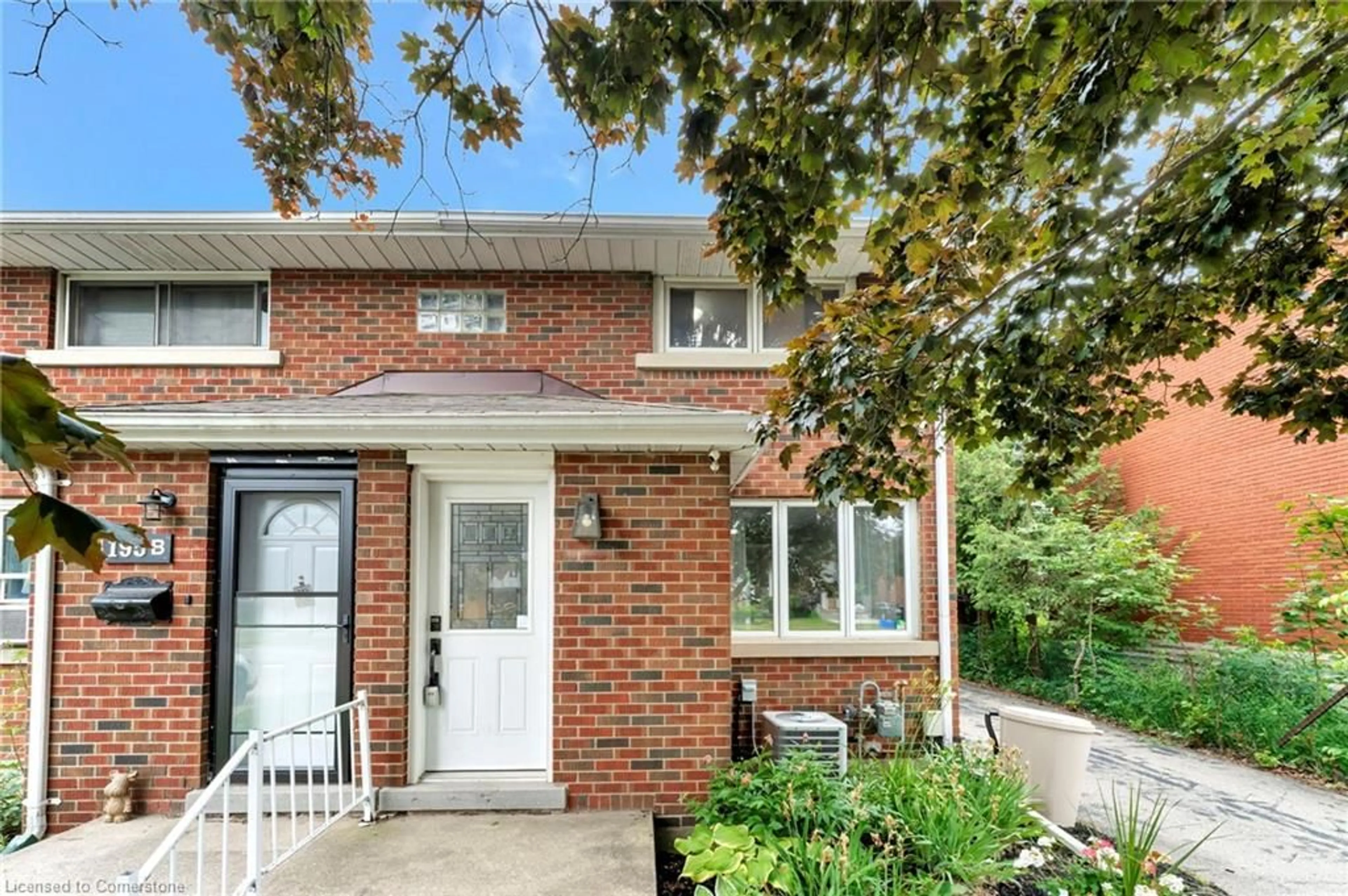 Home with brick exterior material, street for 195 Erb St #A, Waterloo Ontario N2J 1M7