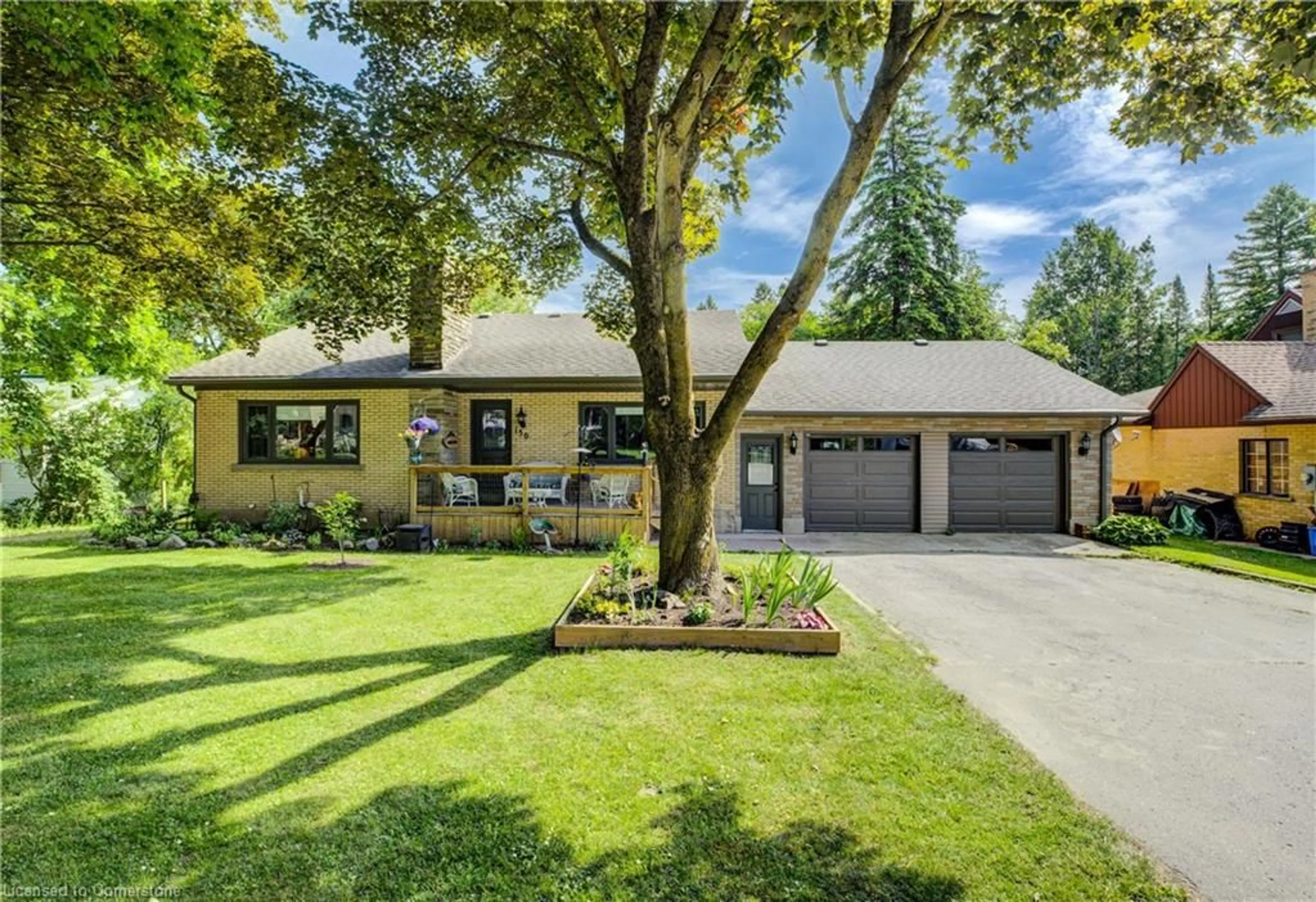 Home with vinyl exterior material, street for 150 Normanby St, Mount Forest Ontario N0G 2L1