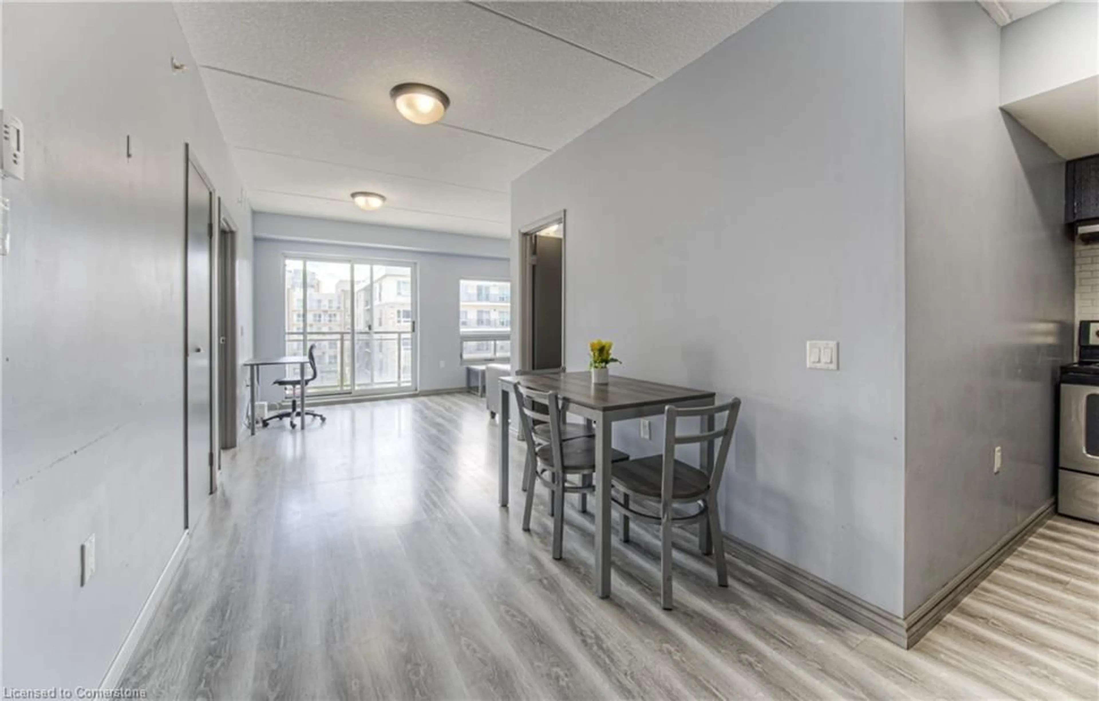 Dining room, wood/laminate floor for 275 Larch St #F311, Waterloo Ontario N2L 3R2