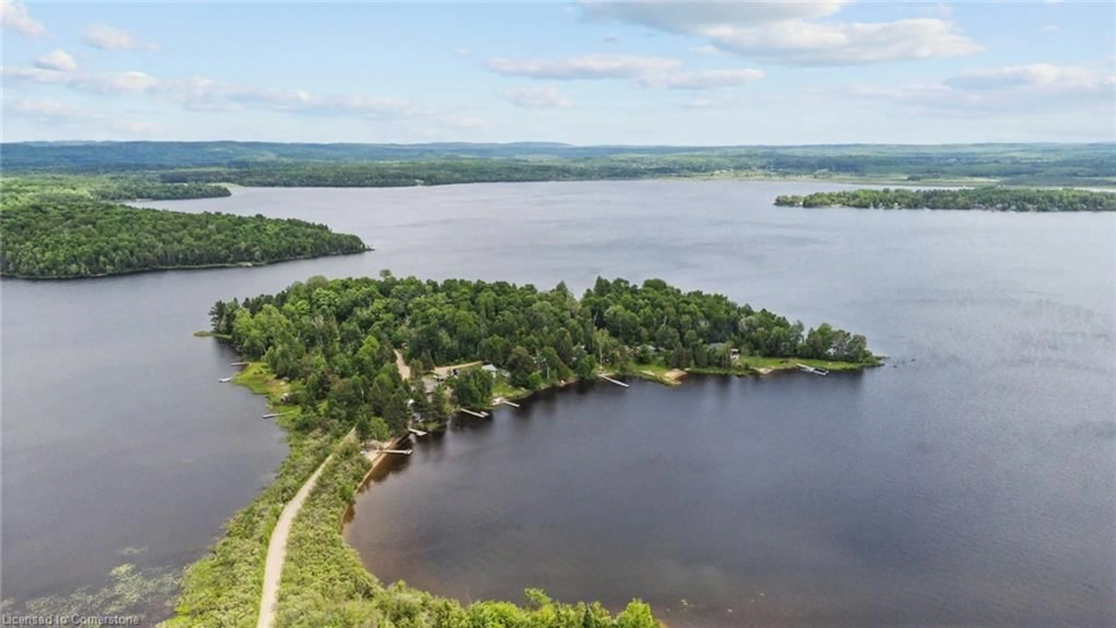 A pic from outside/outdoor area/front of a property/back of a property/a pic from drone, water/lake/river/ocean view for 485 Mallard Haven Rd, Astorville Ontario P0H 1B0