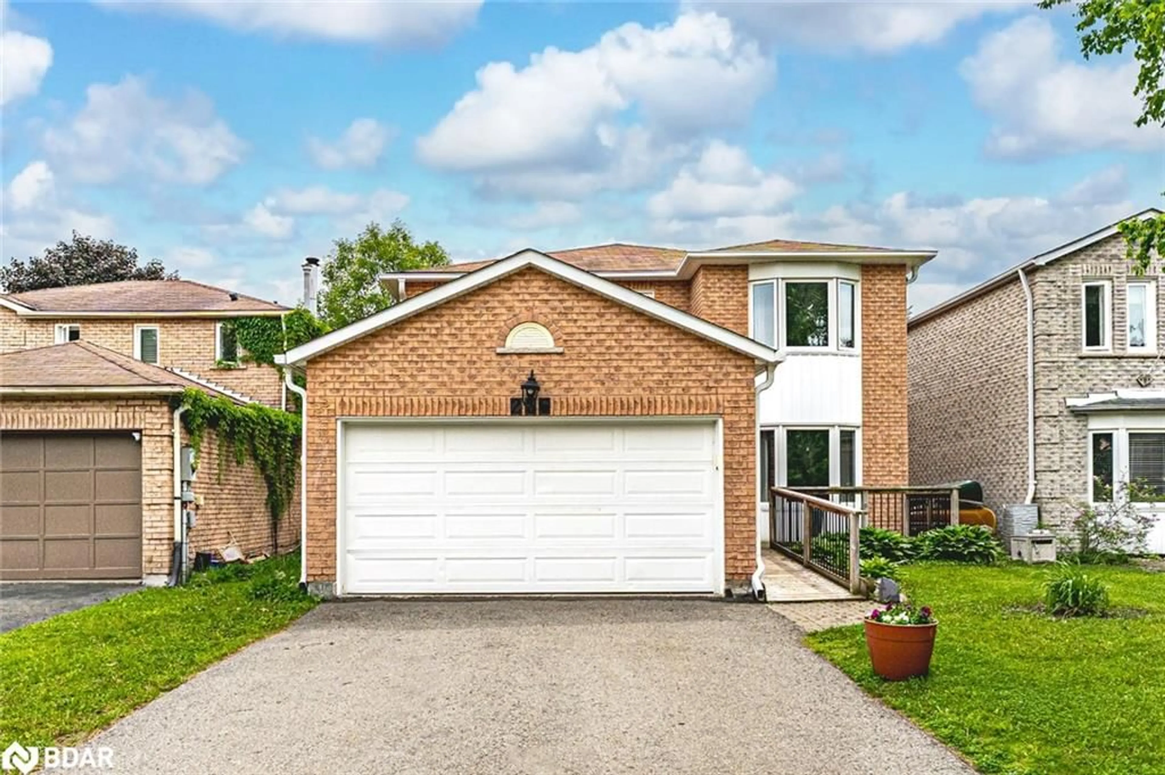 Home with brick exterior material, street for 256 Hickling Trail, Barrie Ontario L4M 5W7