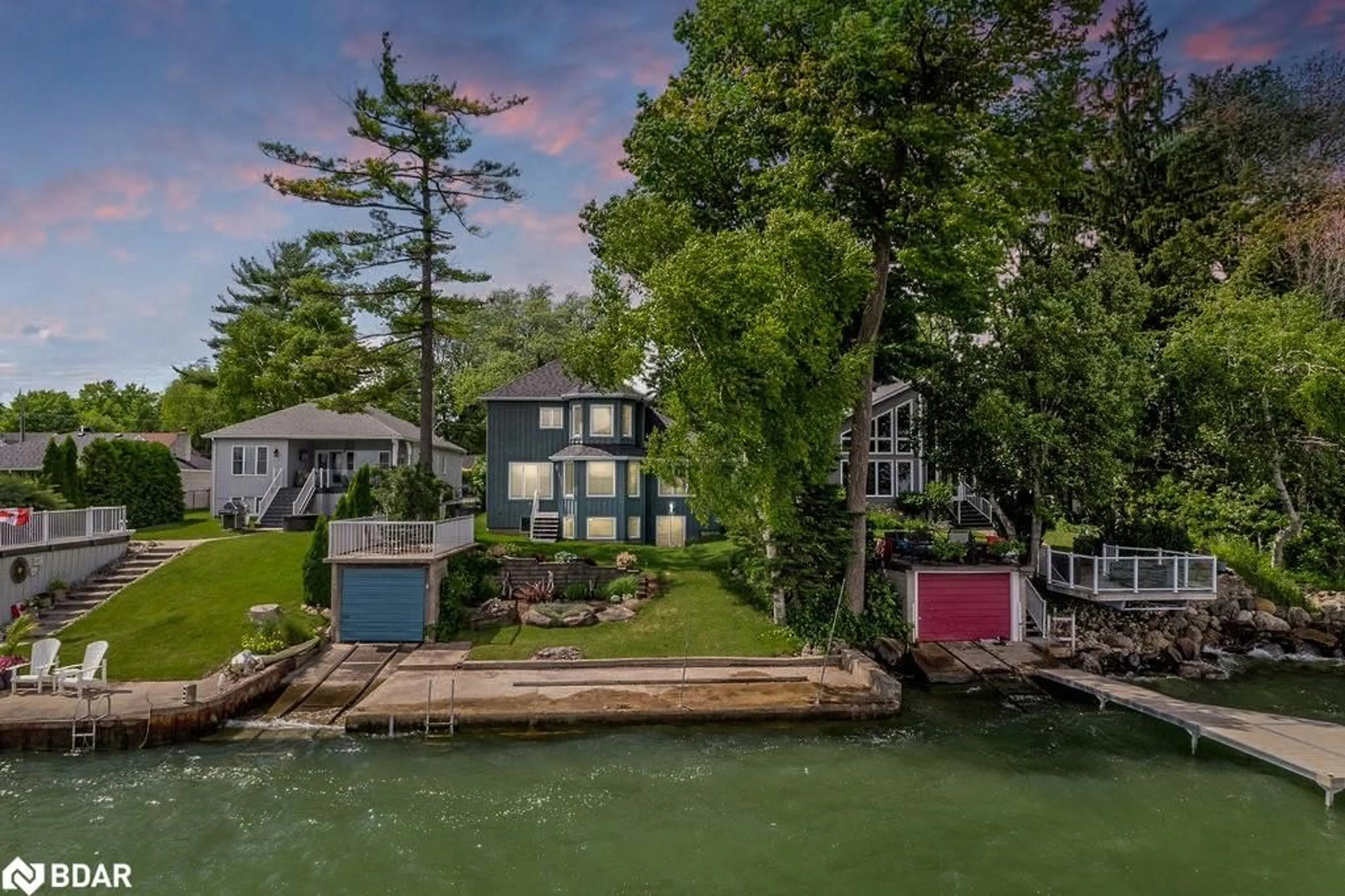 A pic from outside/outdoor area/front of a property/back of a property/a pic from drone, water/lake/river/ocean view for 665 Lakelands Ave, Innisfil Ontario L9S 4E5
