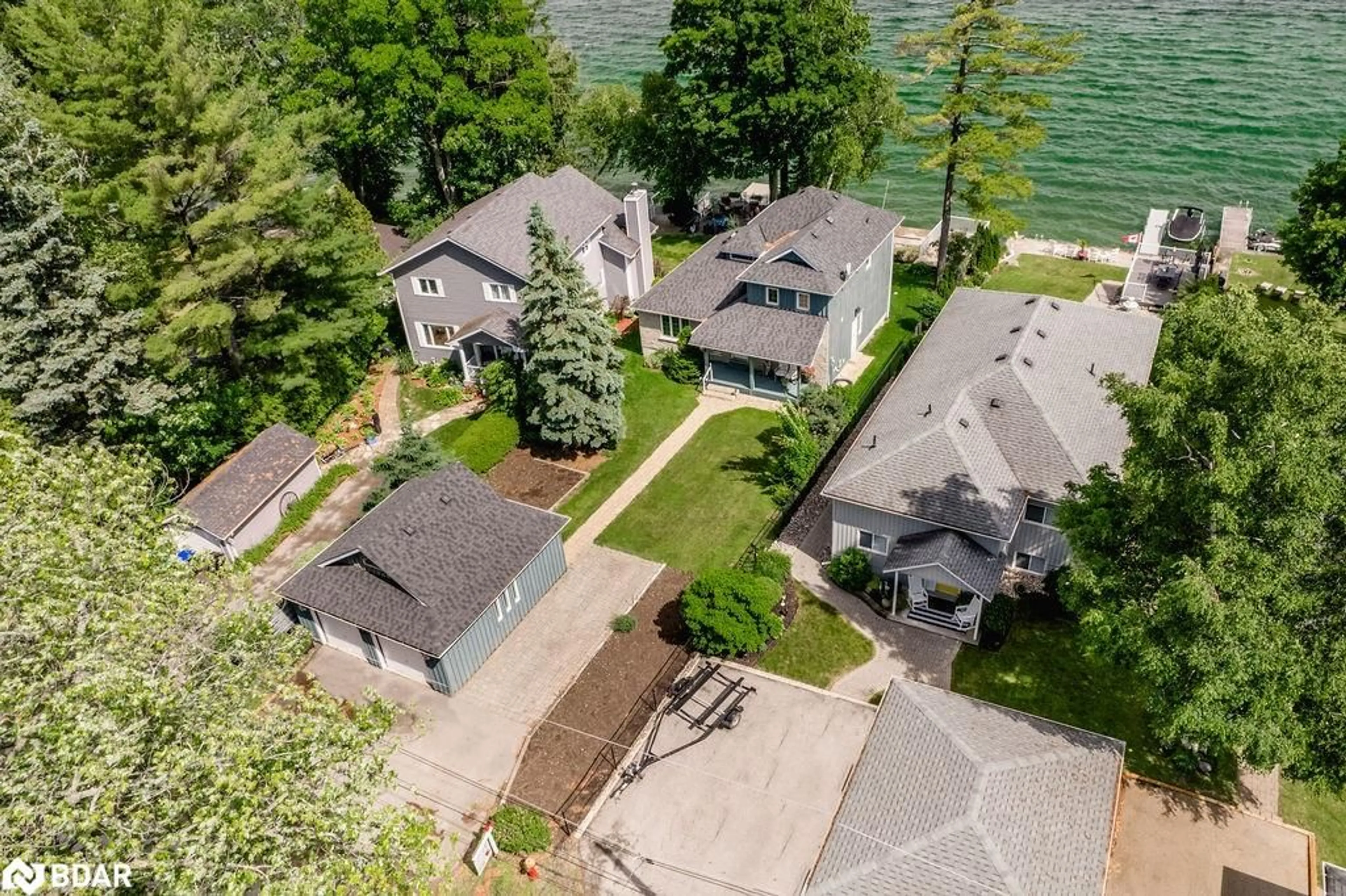 A pic from outside/outdoor area/front of a property/back of a property/a pic from drone, water/lake/river/ocean view for 665 Lakelands Ave, Innisfil Ontario L9S 4E5