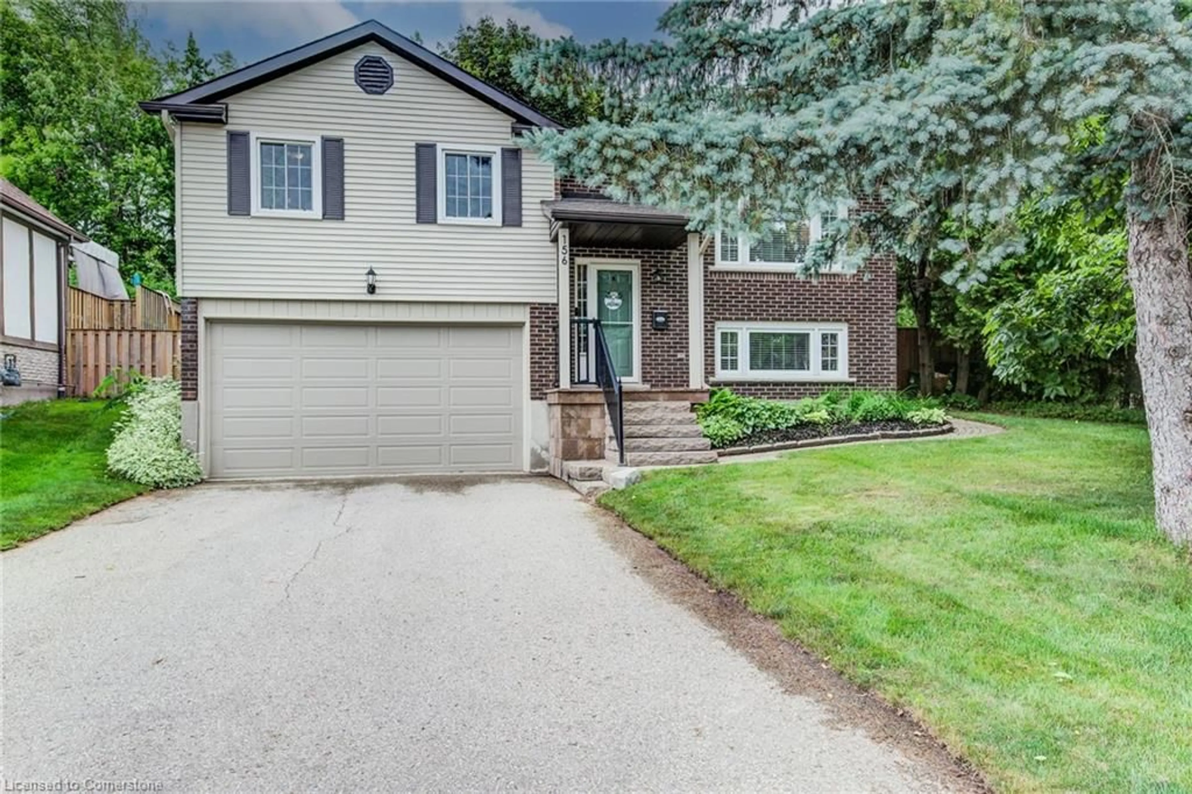 Home with vinyl exterior material, street for 156 Marksam Rd, Guelph Ontario N1H 6T6