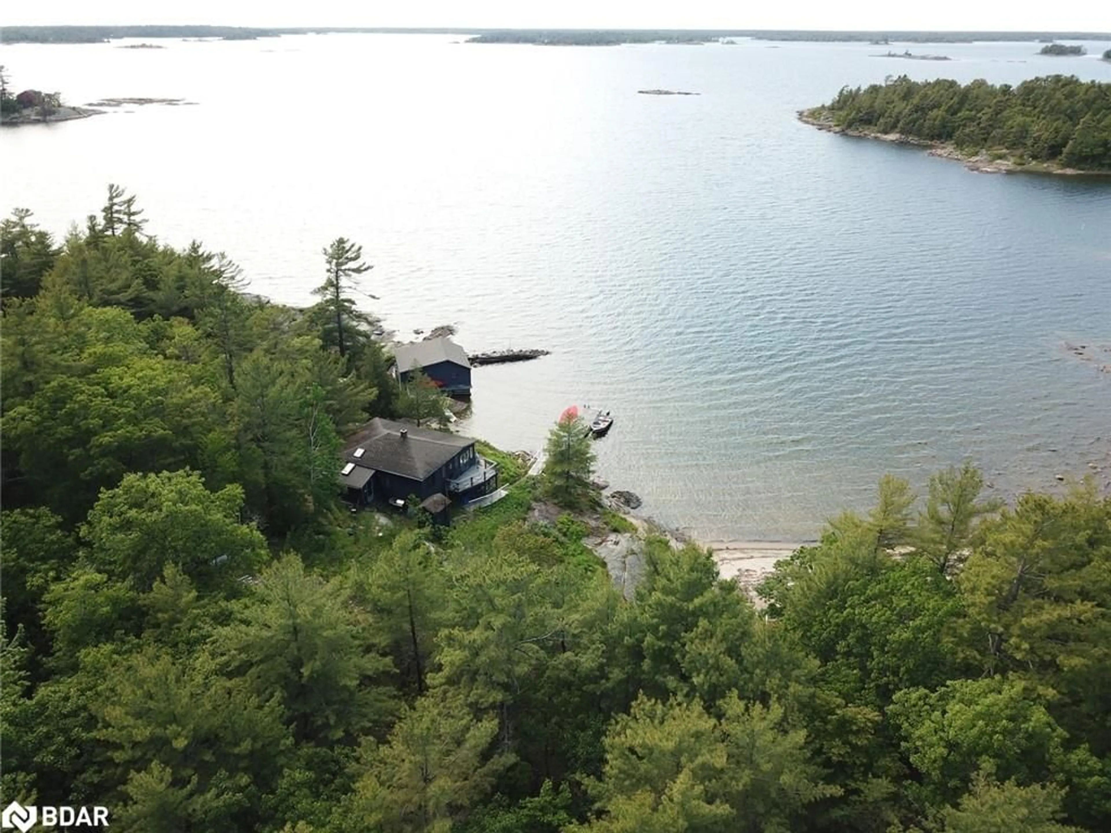 A pic from outside/outdoor area/front of a property/back of a property/a pic from drone, water/lake/river/ocean view for 25 Shawanaga Landing Rd, Pointe au Baril Ontario P0G 1K0
