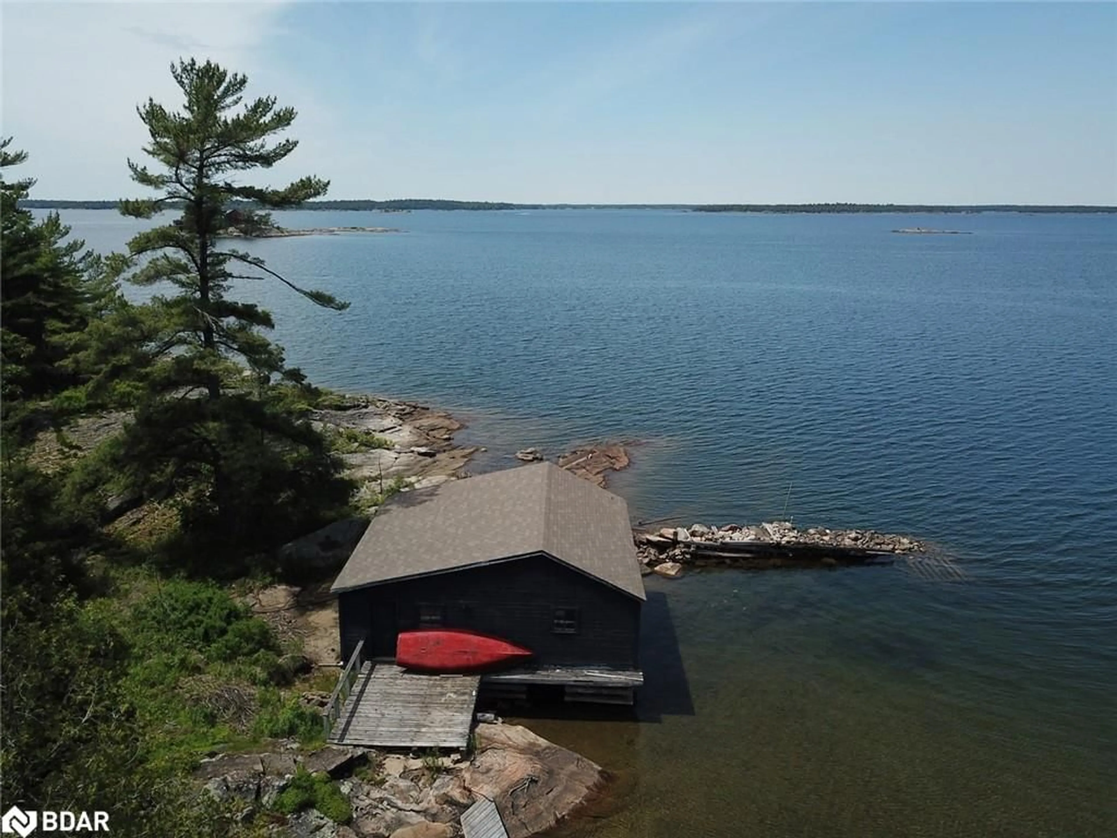 A pic from outside/outdoor area/front of a property/back of a property/a pic from drone, water/lake/river/ocean view for 25 Shawanaga Landing Rd, Pointe au Baril Ontario P0G 1K0