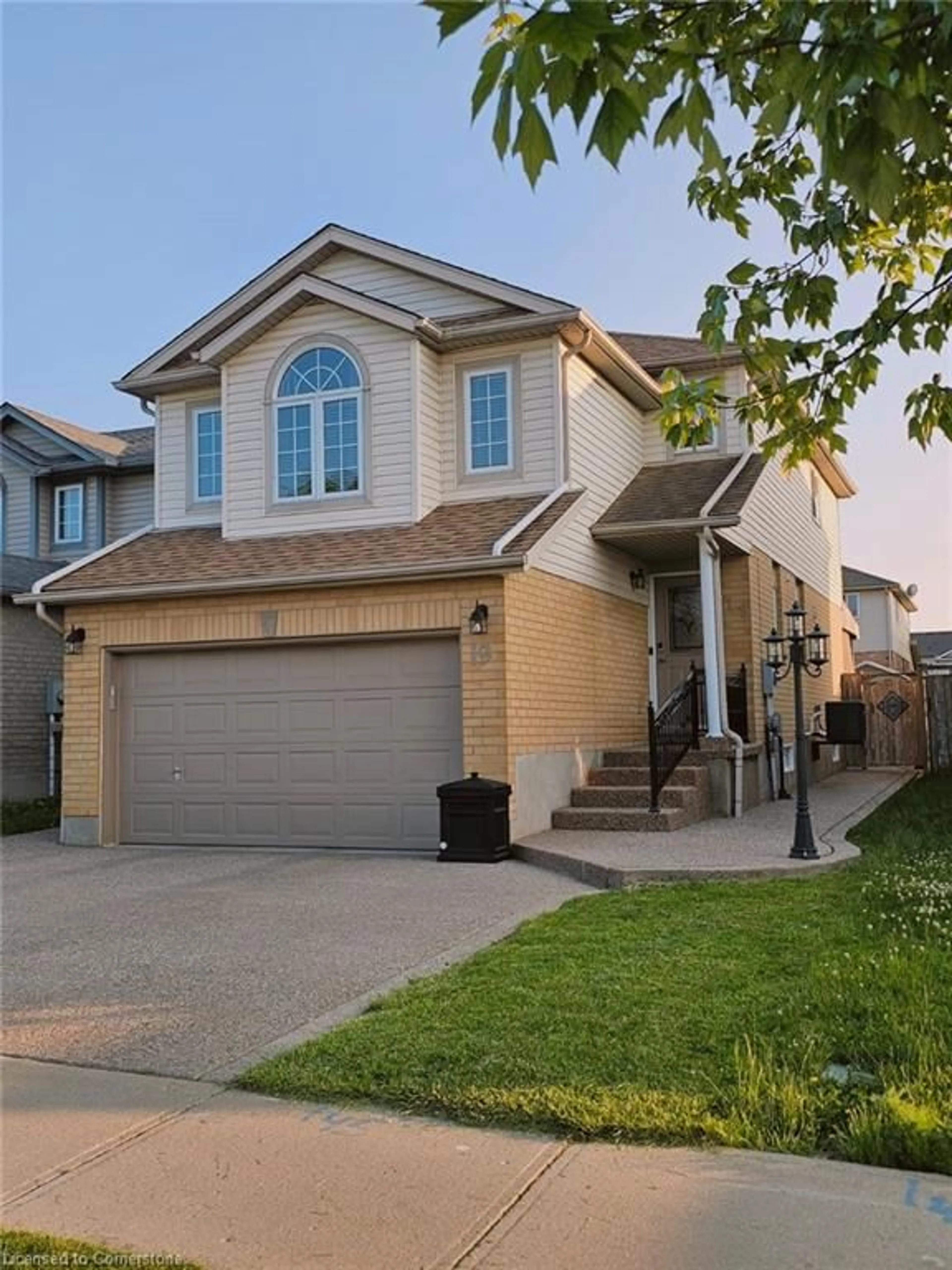 Home with vinyl exterior material, street for 19 Cotton Grass St, Kitchener Ontario N2E 3T7