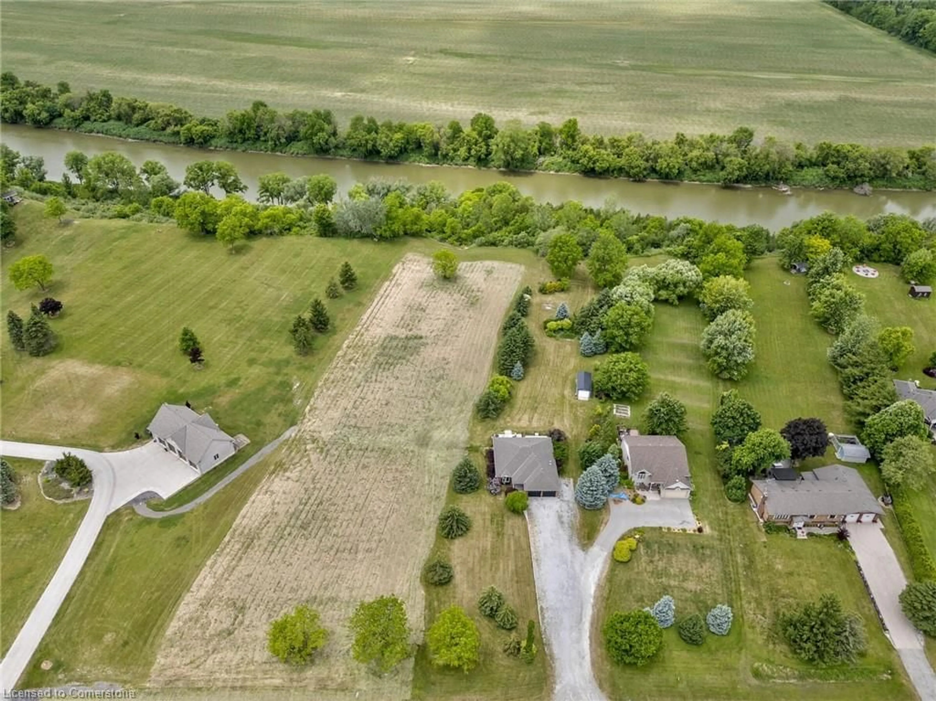 A pic from outside/outdoor area/front of a property/back of a property/a pic from drone, water/lake/river/ocean view for 307 Brant County Rd #18, Brantford Ontario N3T 3J8