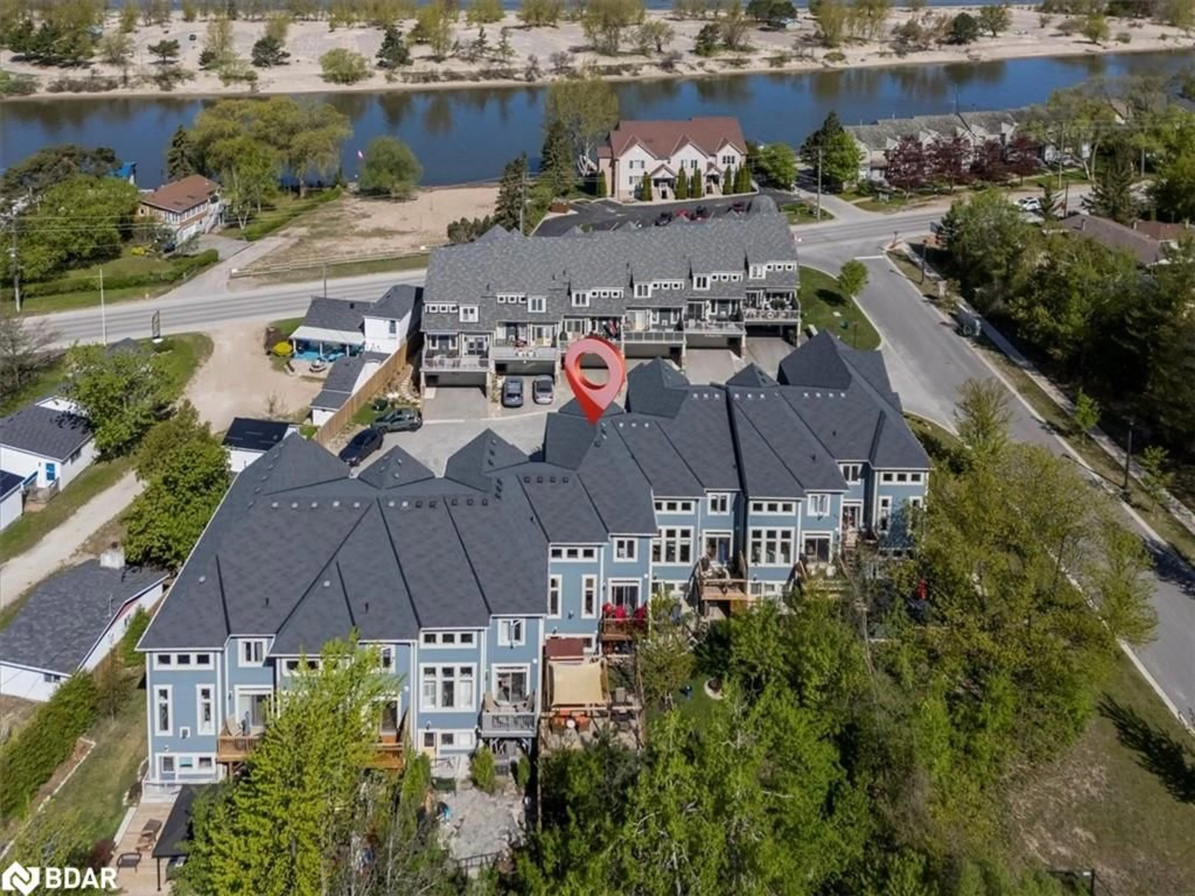 A pic from outside/outdoor area/front of a property/back of a property/a pic from drone, water/lake/river/ocean view for 8 Nautical Lane, Wasaga Beach Ontario L9Z 0G1