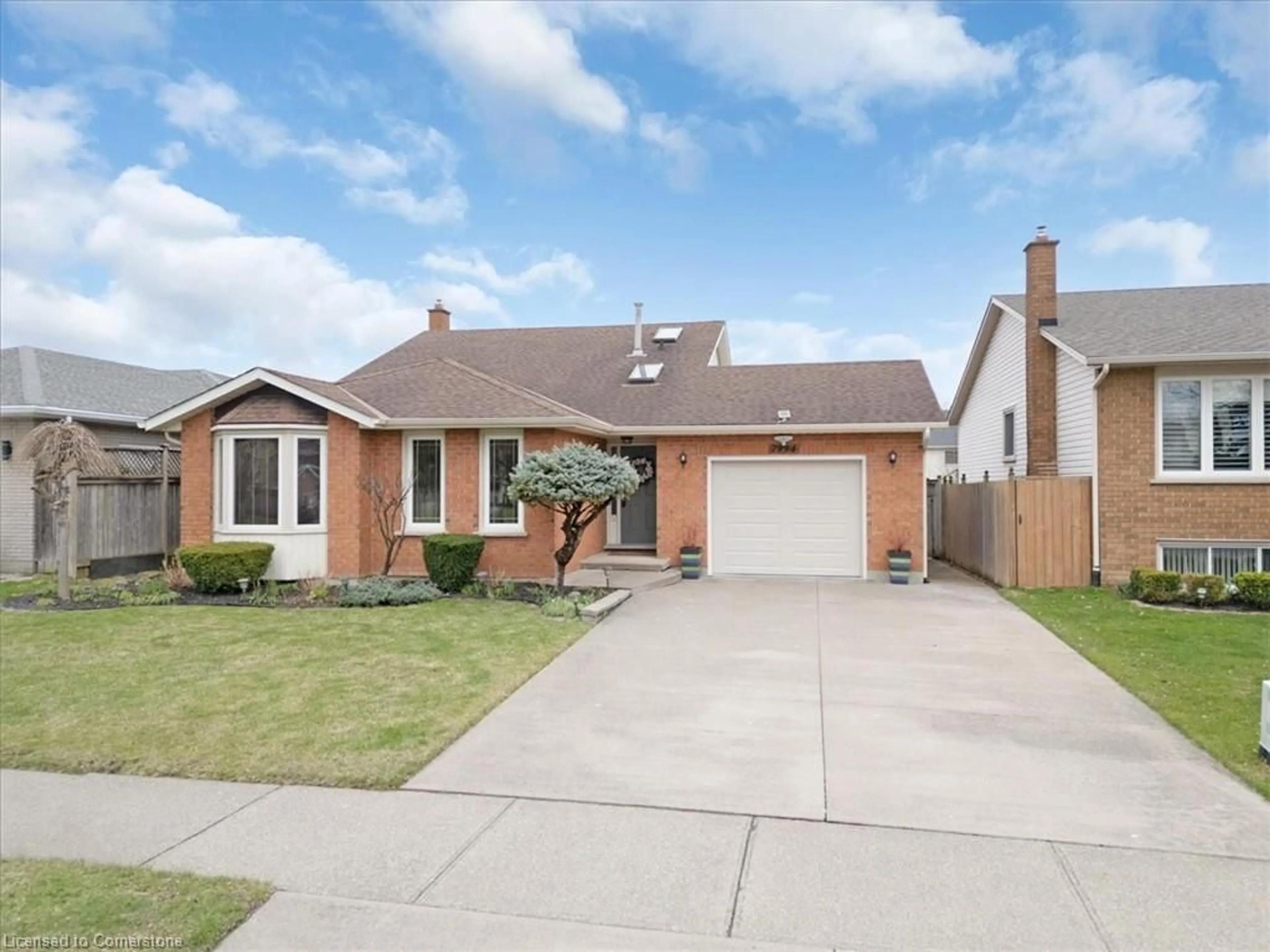 Home with brick exterior material, street for 7994 Oakridge Dr, Niagara Falls Ontario L2H 2W1