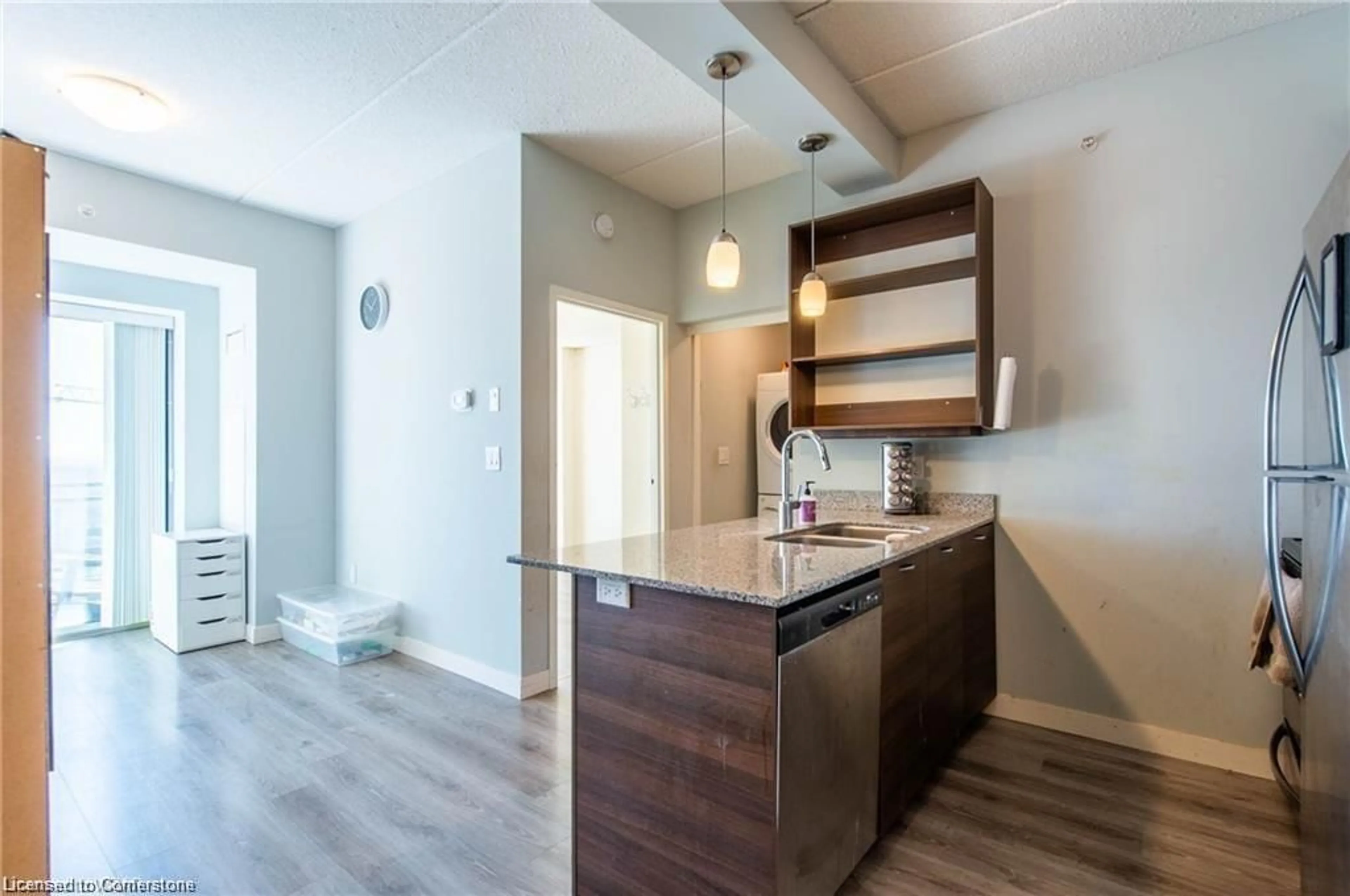 Open concept kitchen, wood/laminate floor for 318 Spruce St #1804, Waterloo Ontario N2L 3M6