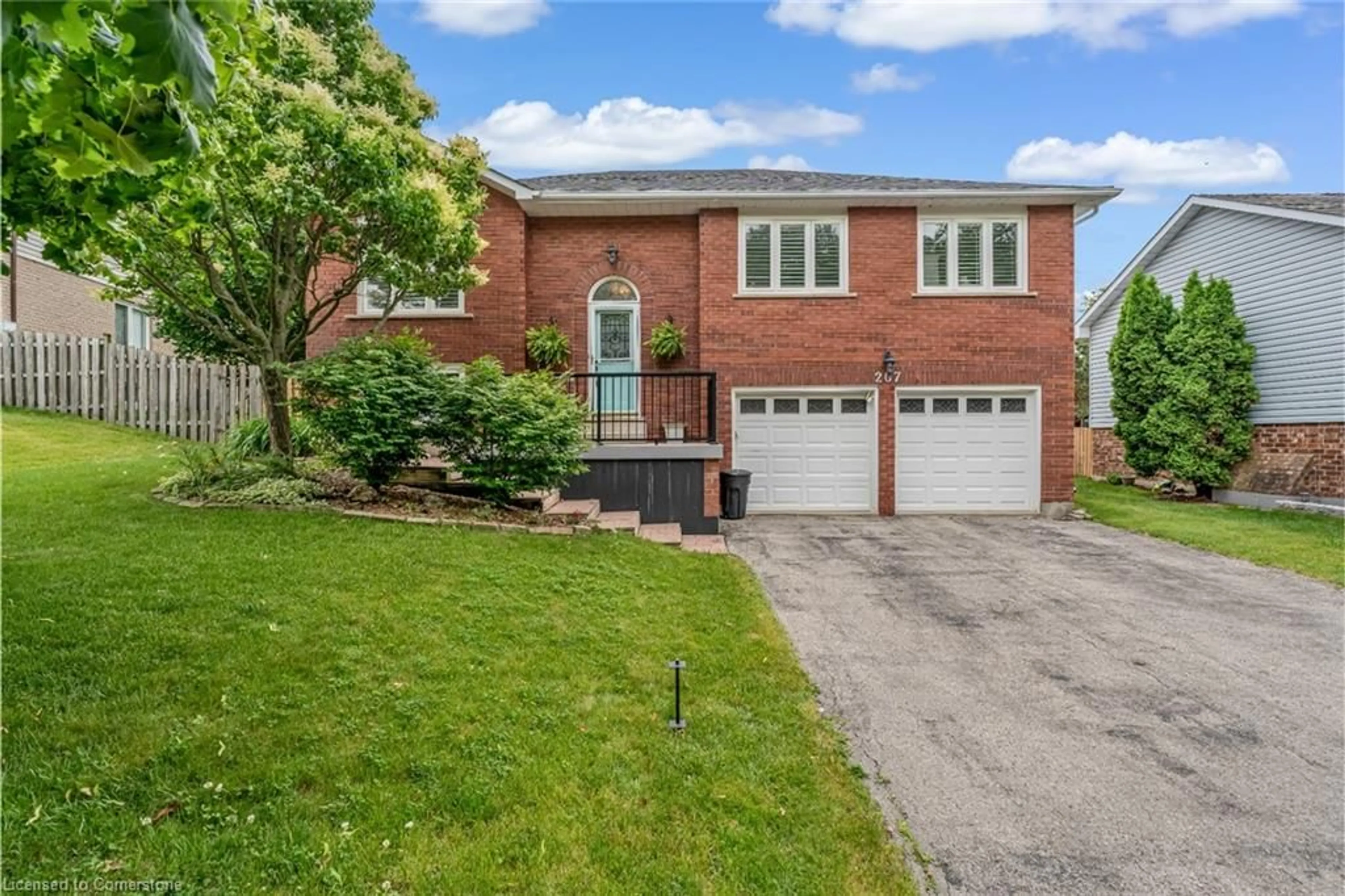 Home with brick exterior material, street for 207 Williamson Dr, Caledonia Ontario N3W 1A5
