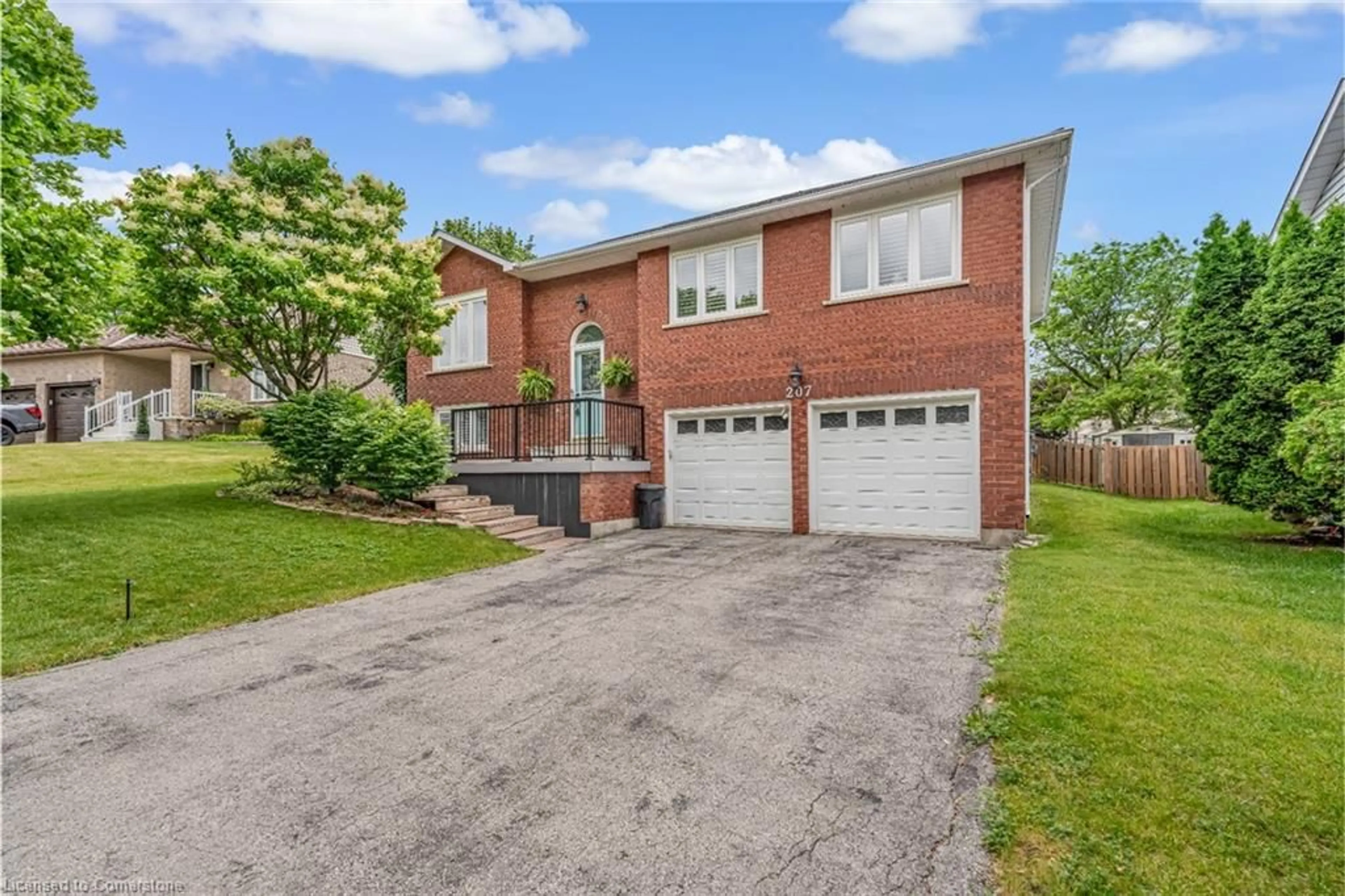 Home with brick exterior material, street for 207 Williamson Dr, Caledonia Ontario N3W 1A5