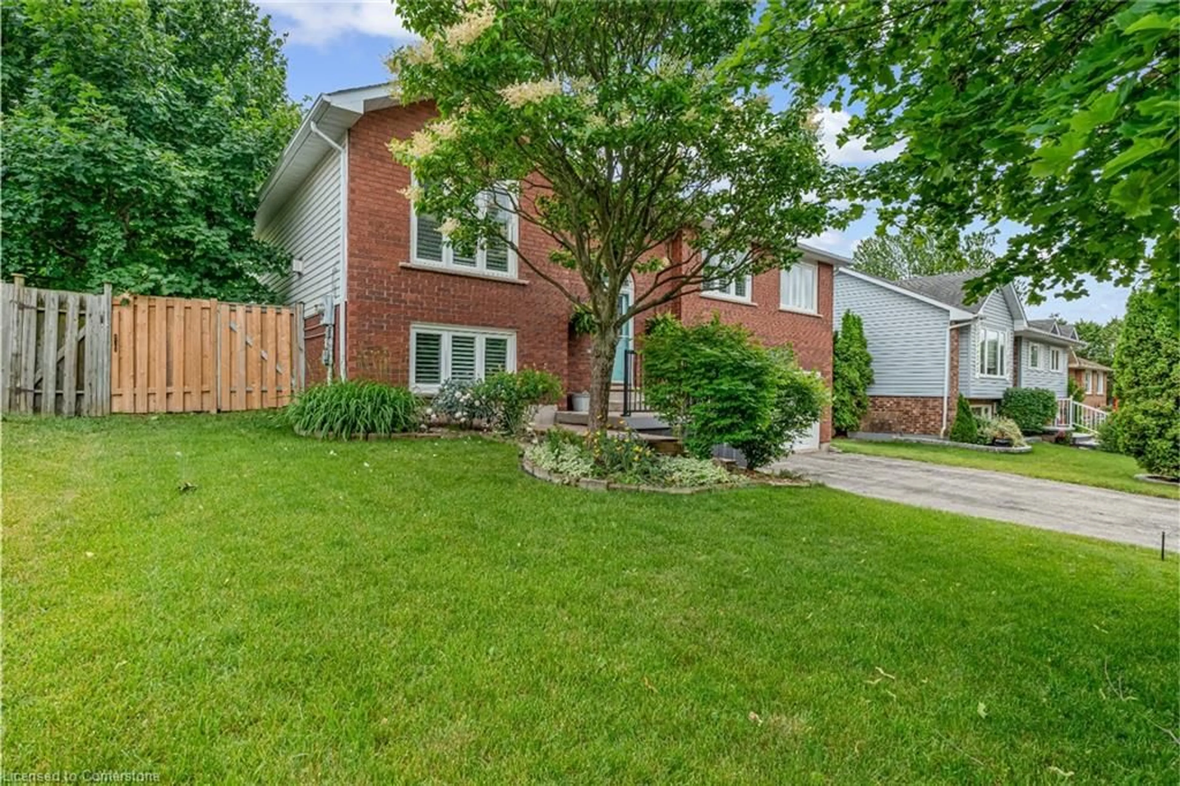 Home with brick exterior material, street for 207 Williamson Dr, Caledonia Ontario N3W 1A5