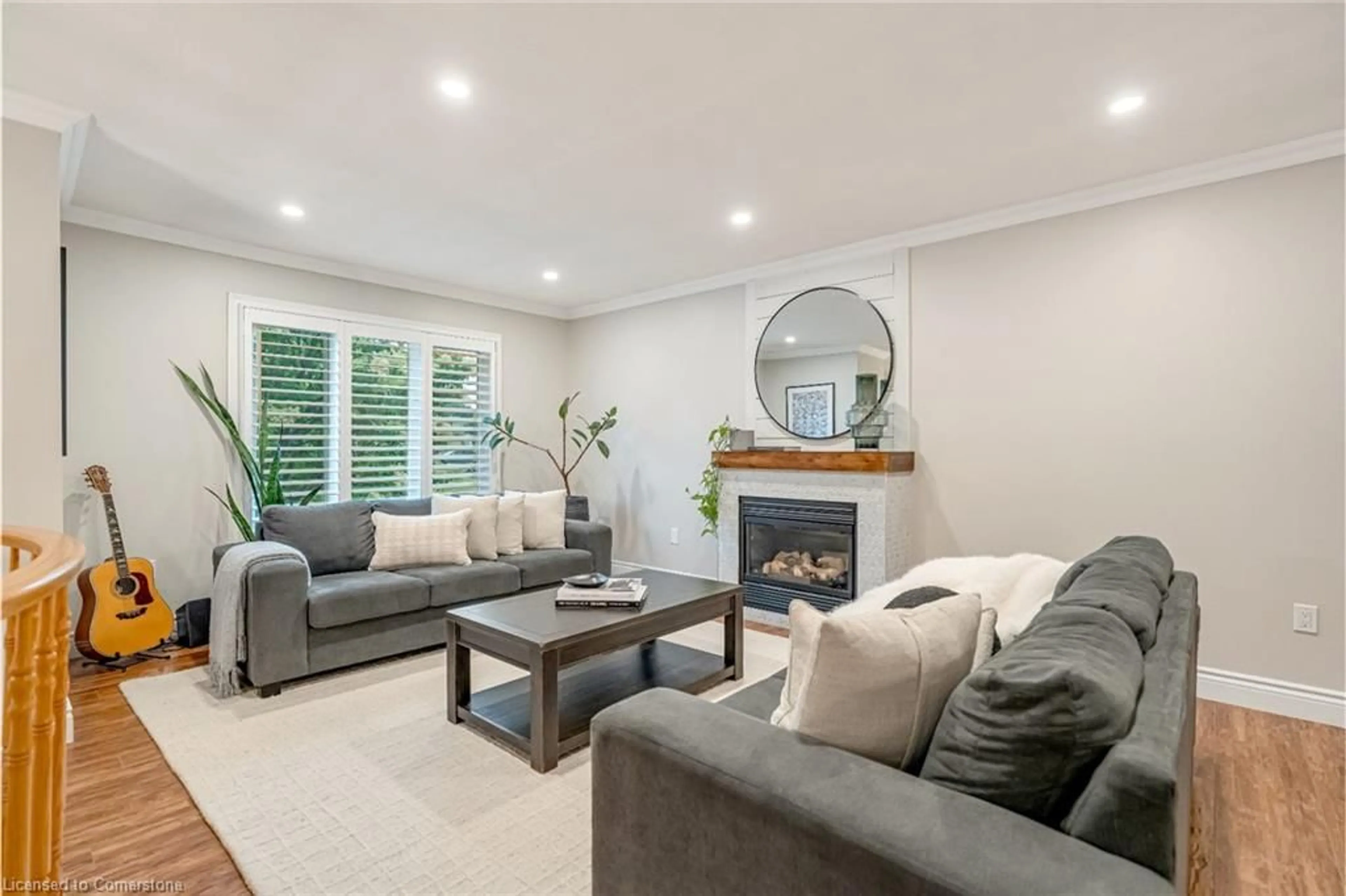 Living room with furniture, unknown for 207 Williamson Dr, Caledonia Ontario N3W 1A5