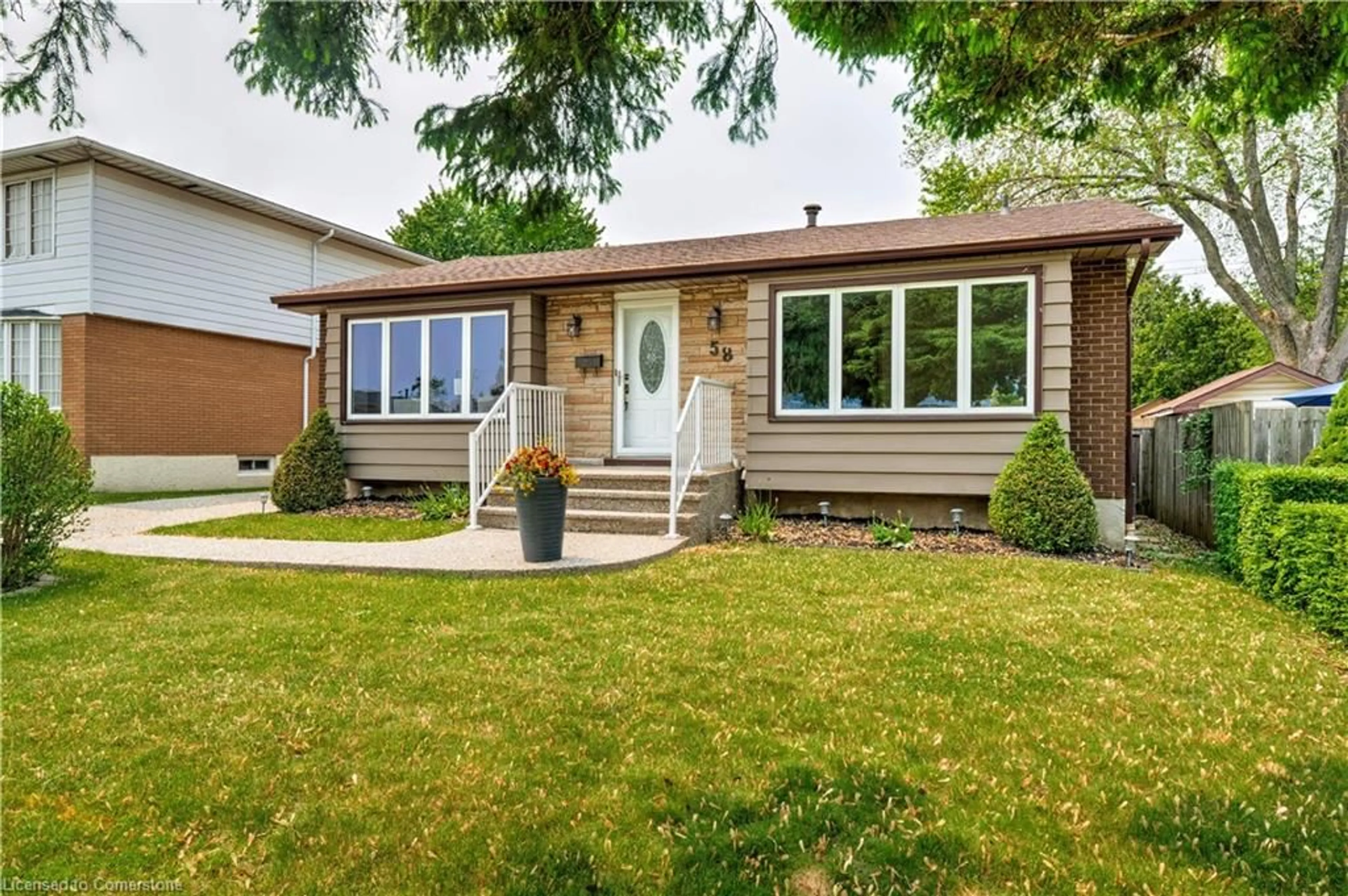 Home with vinyl exterior material, street for 58 Goldfinch Rd, Hamilton Ontario L9A 3W7