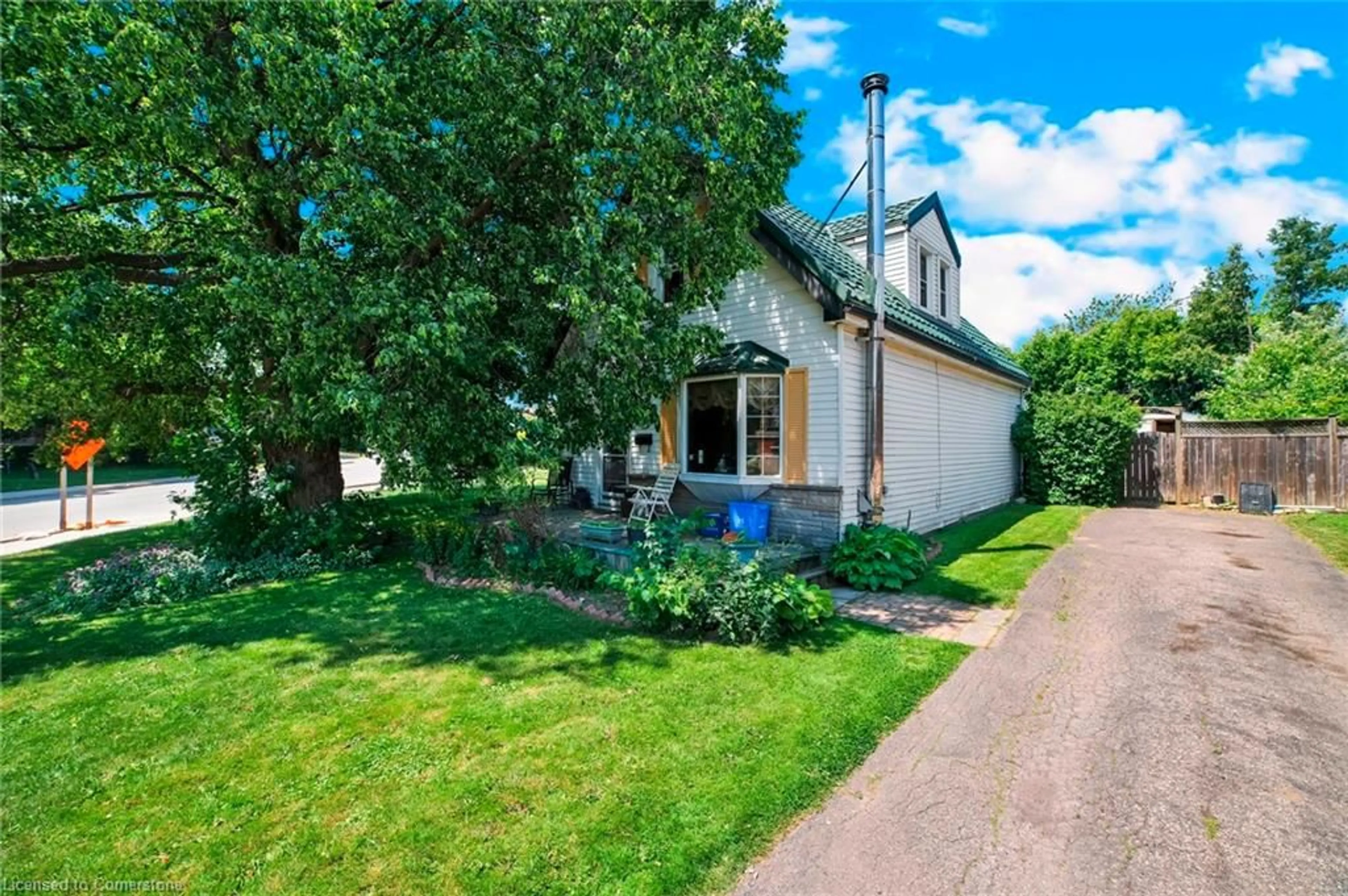 A pic from outside/outdoor area/front of a property/back of a property/a pic from drone, street for 38 Caledon Ave, Hamilton Ontario L9C 3C6