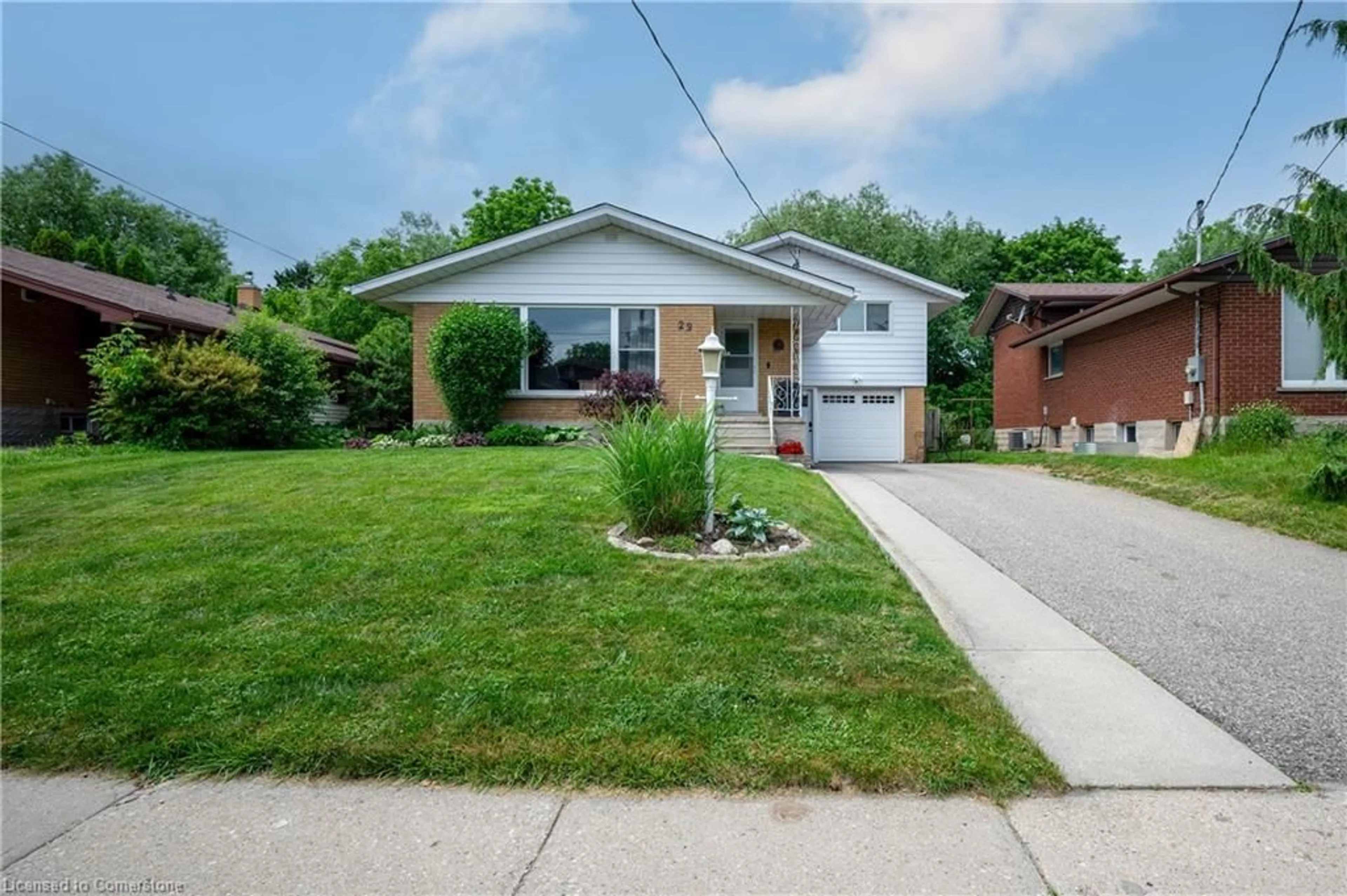 Home with brick exterior material, street for 29 Ruskview Rd, Kitchener Ontario N2M 4S1