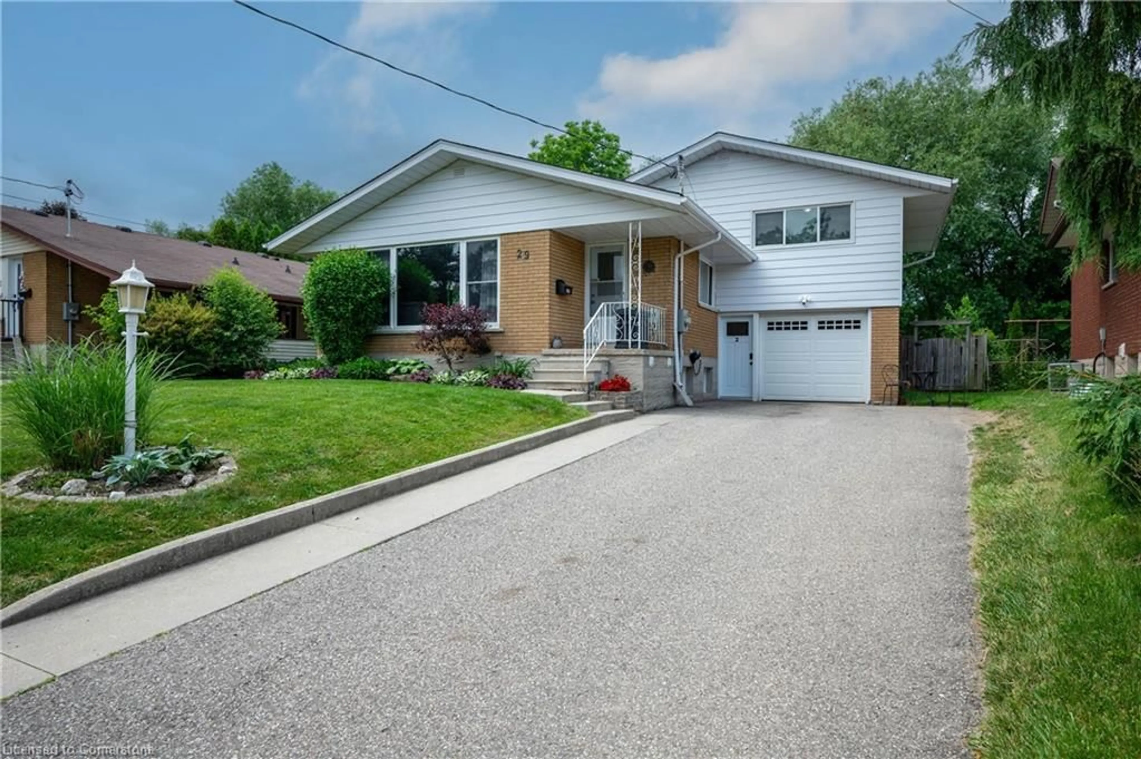 Home with brick exterior material, street for 29 Ruskview Rd, Kitchener Ontario N2M 4S1