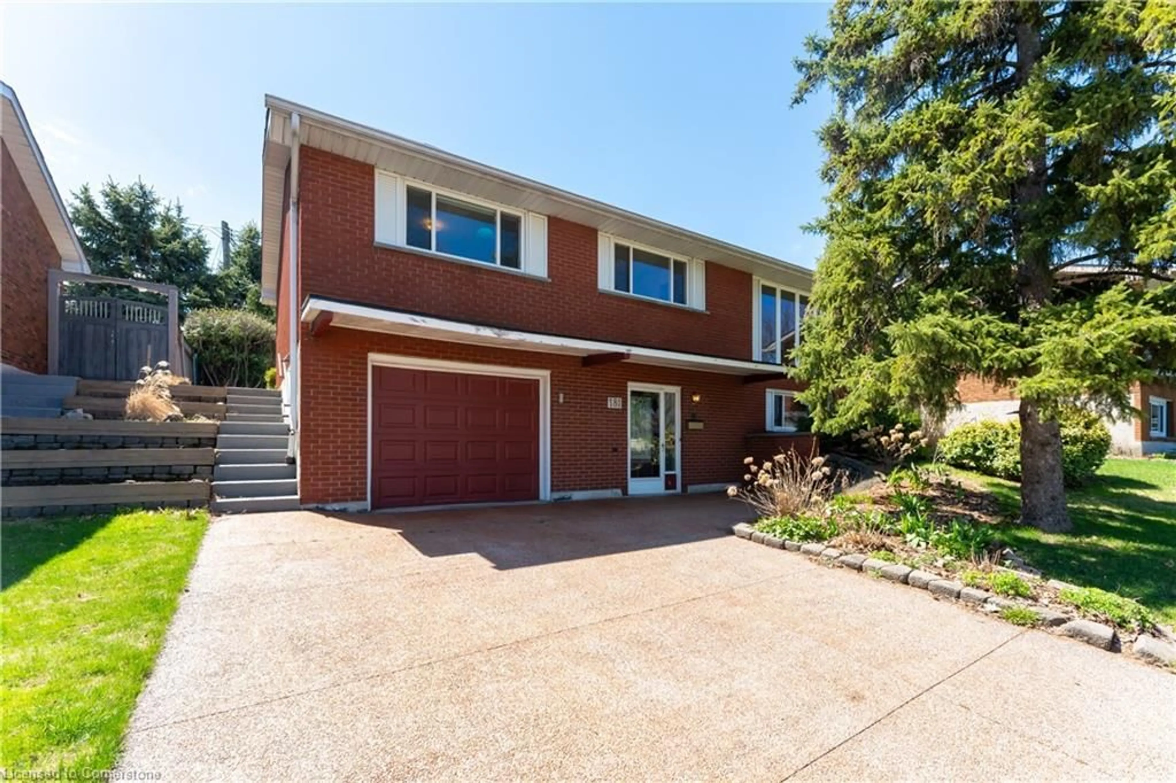 Home with brick exterior material, street for 181 Burrwood Dr, Hamilton Ontario L9C 3T3