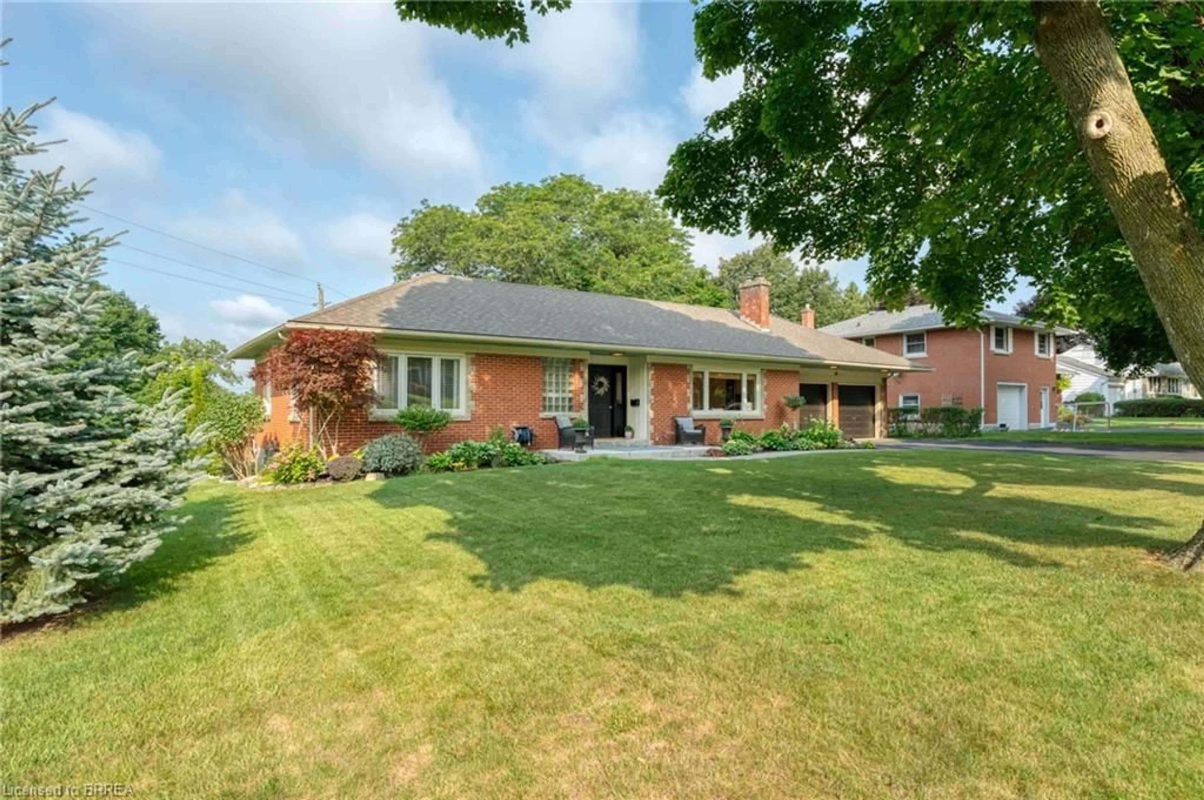 Home with brick exterior material, street for 26 Simcoe Blvd, Simcoe Ontario N3Y 3L7