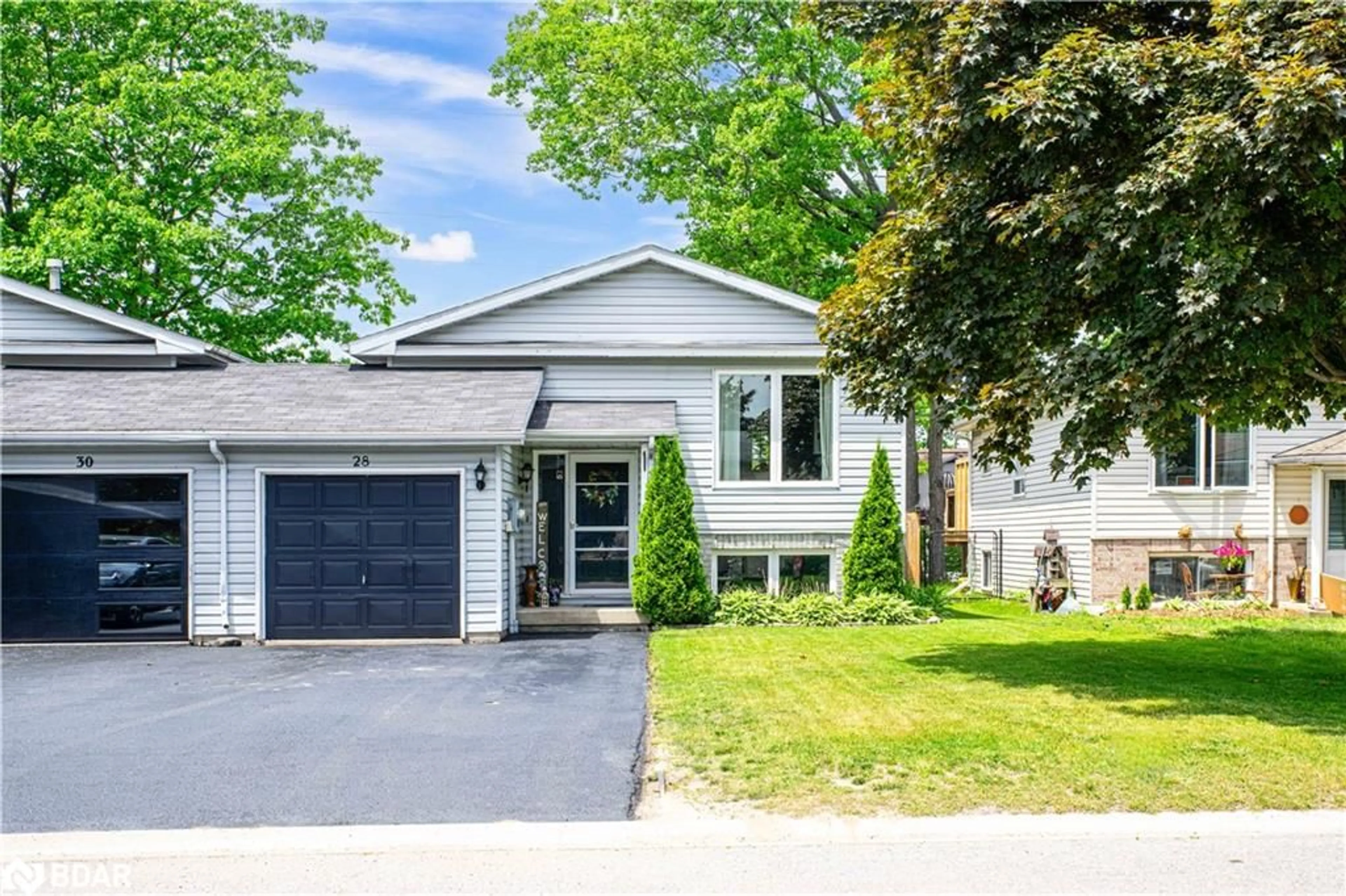 Home with brick exterior material, street for 28 Dyer Dr, Wasaga Beach Ontario L9Z 1E2