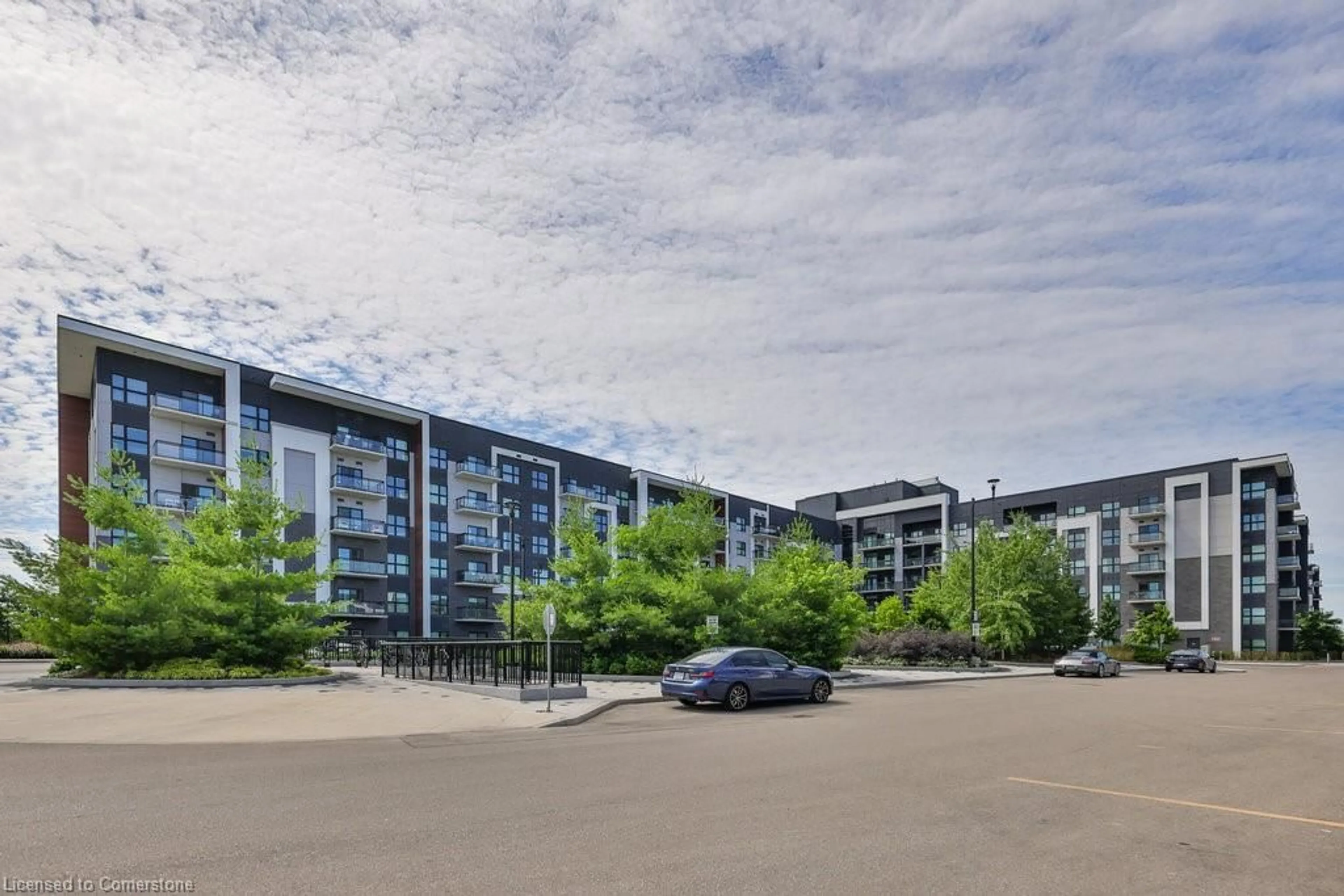 A pic from outside/outdoor area/front of a property/back of a property/a pic from drone, unknown for 128 Grovewood Common #509, Oakville Ontario L6H 0X3