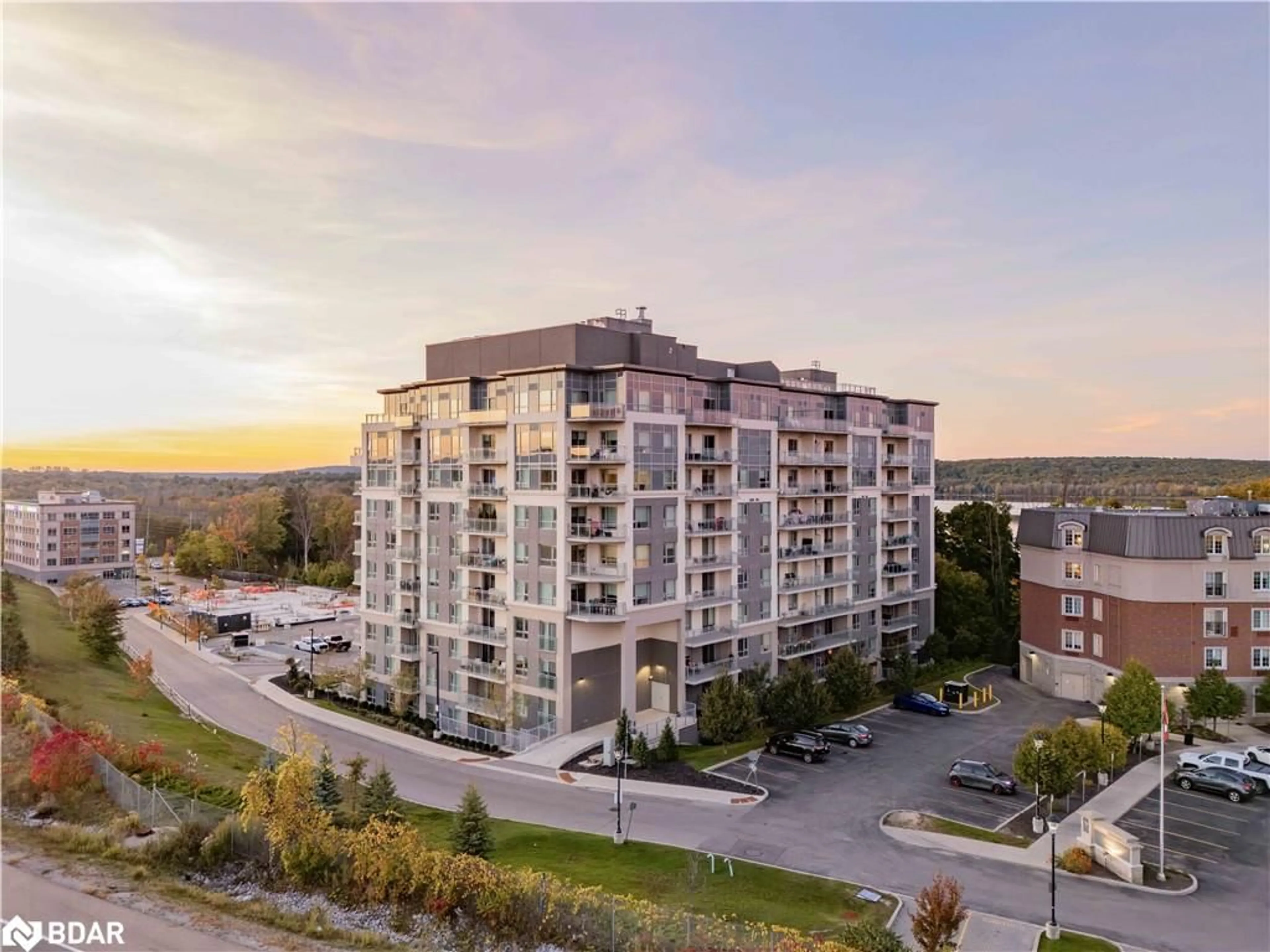 A pic from outside/outdoor area/front of a property/back of a property/a pic from drone, unknown for 58 Lakeside Terrace #207, Barrie Ontario L4M 0L5