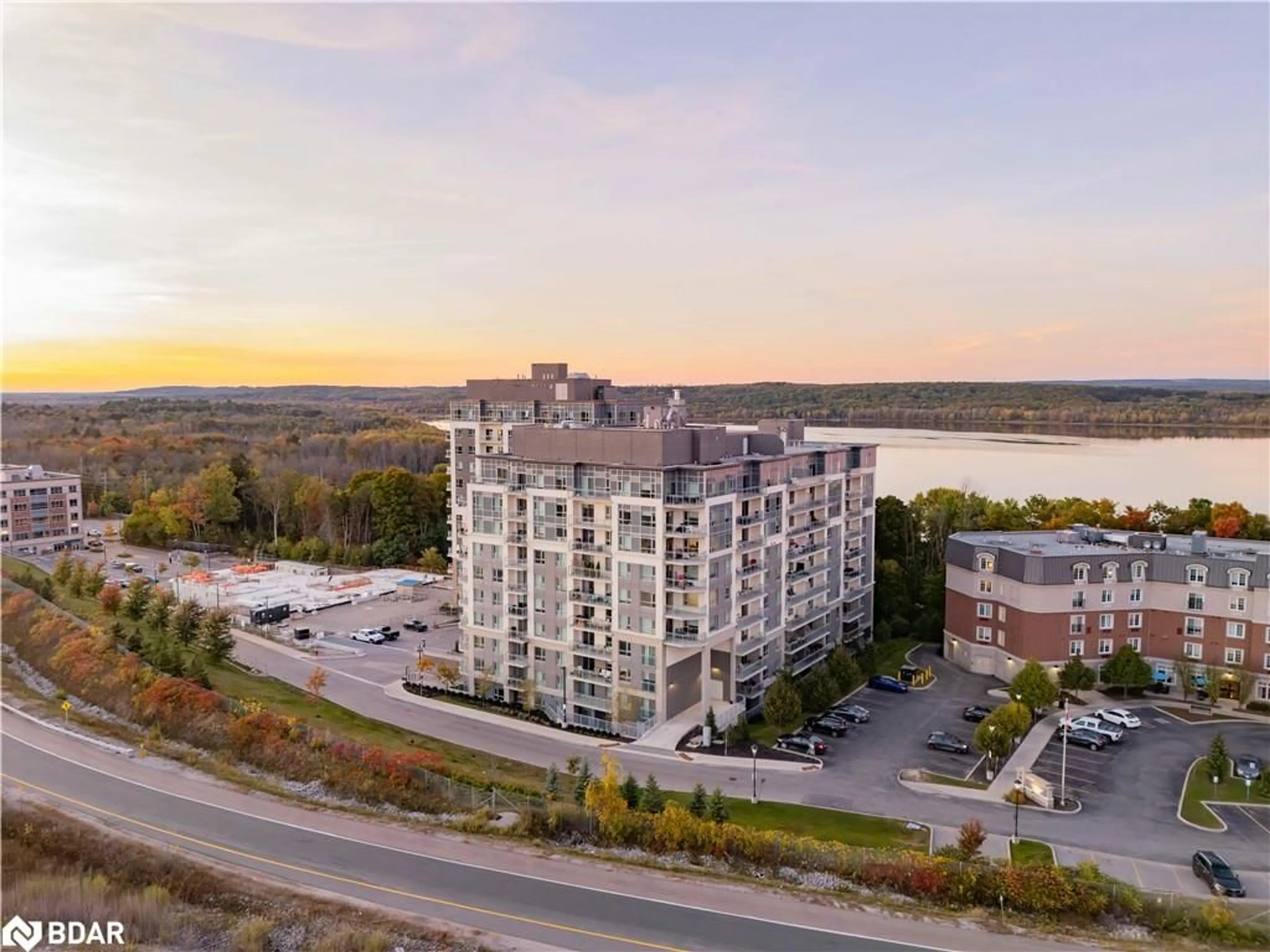 A pic from outside/outdoor area/front of a property/back of a property/a pic from drone, water/lake/river/ocean view for 58 Lakeside Terrace #207, Barrie Ontario L4M 0L5