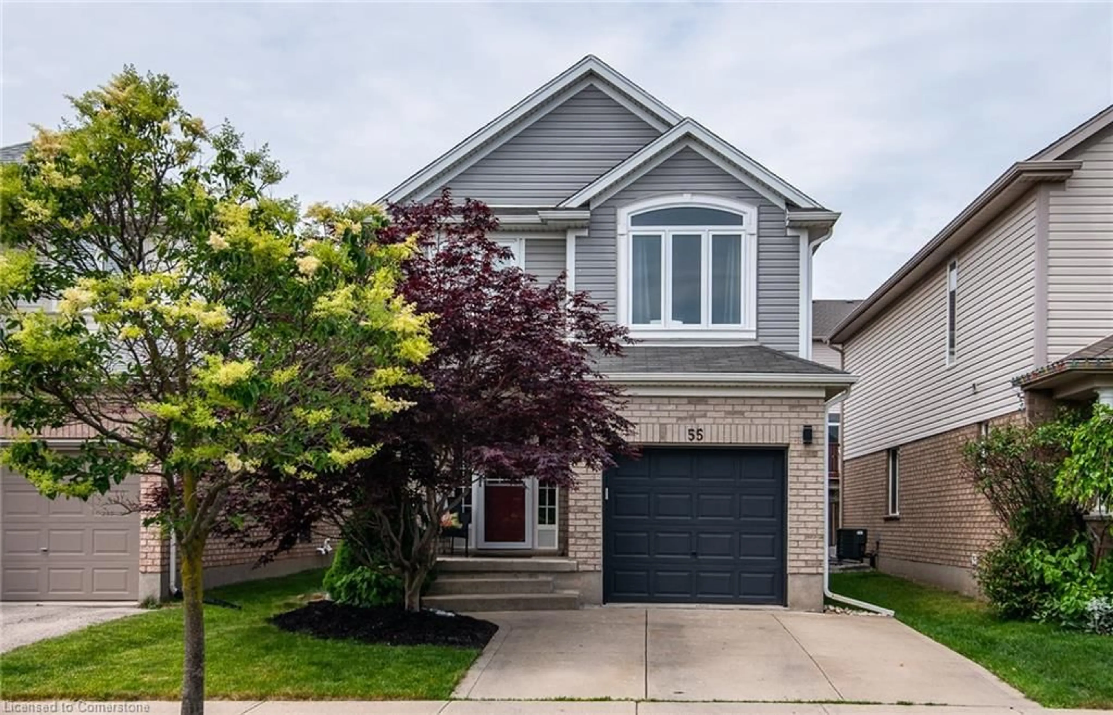 Home with vinyl exterior material, street for 55 Isabella St, Kitchener Ontario N2E 4J8