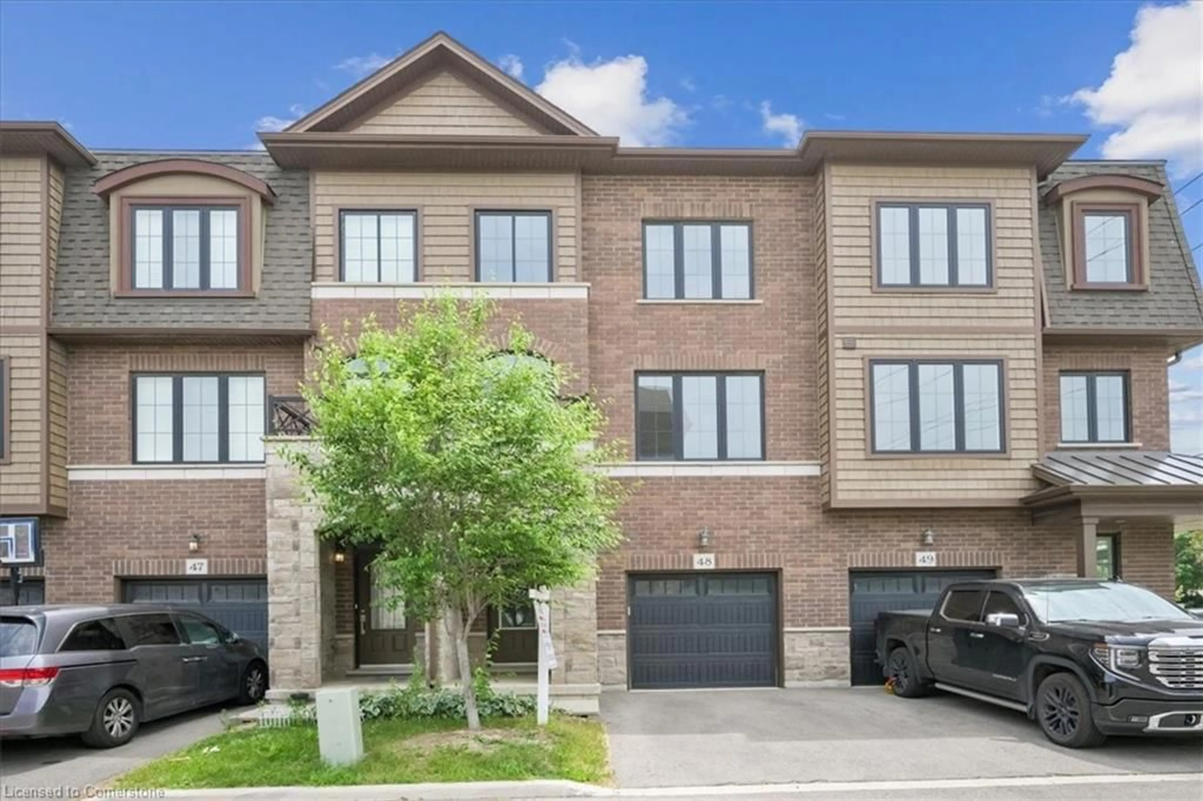 Home with brick exterior material, street for 445 Ontario St #49, Milton Ontario L9T 9K3