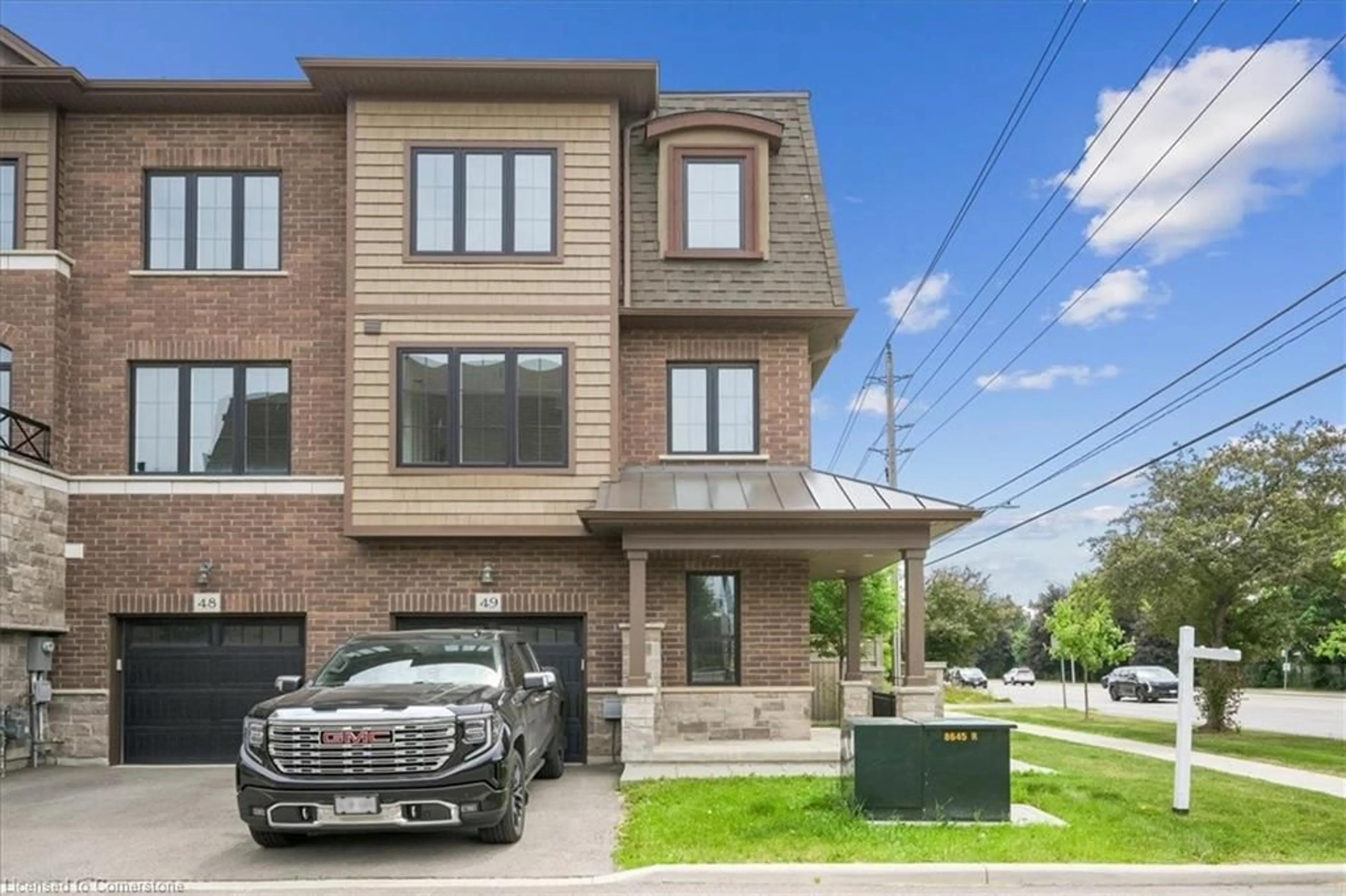 Home with brick exterior material, street for 445 Ontario St #49, Milton Ontario L9T 9K3