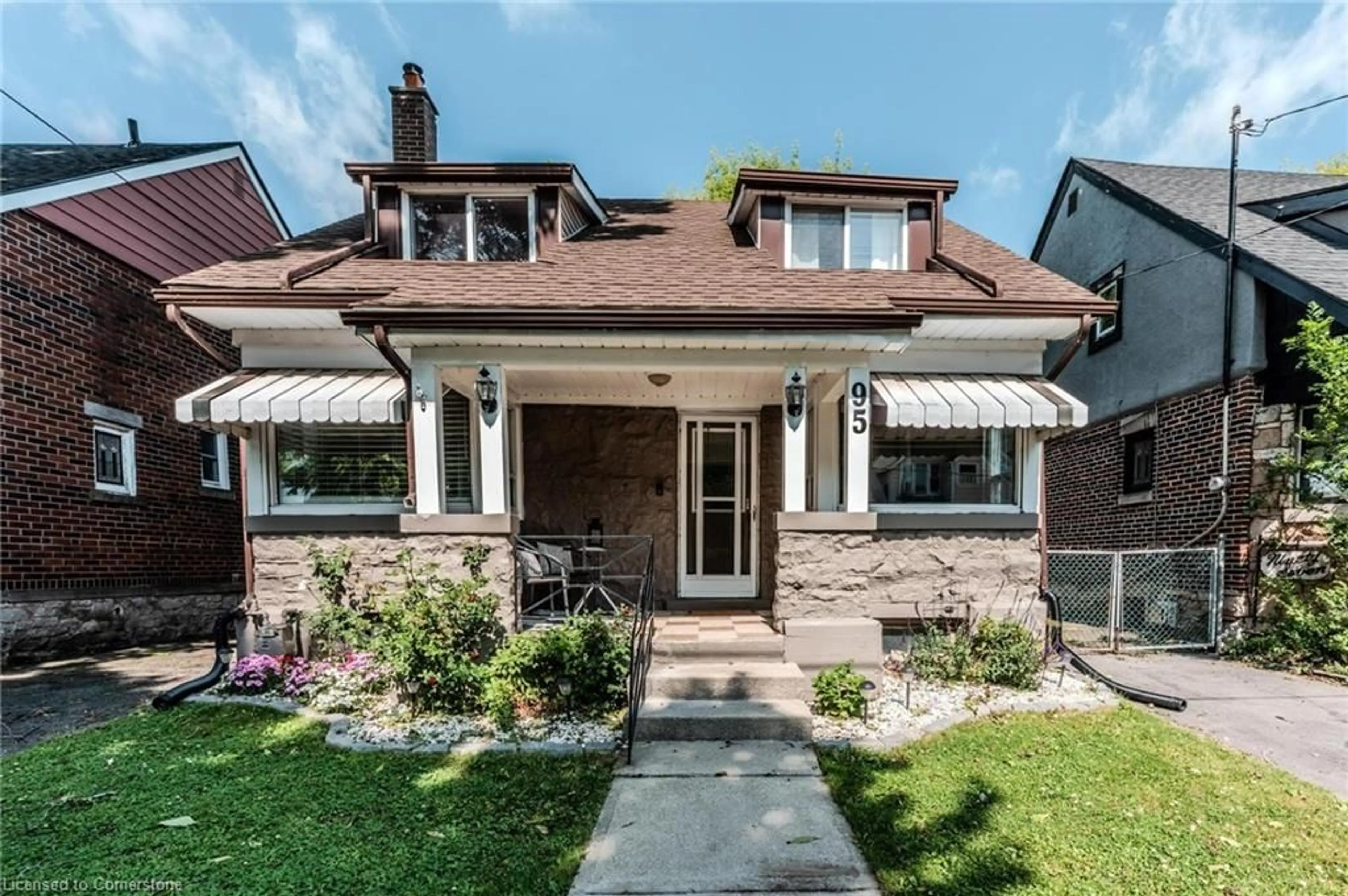 Home with brick exterior material, street for 95 Paradise Rd, Hamilton Ontario L8S 3S9