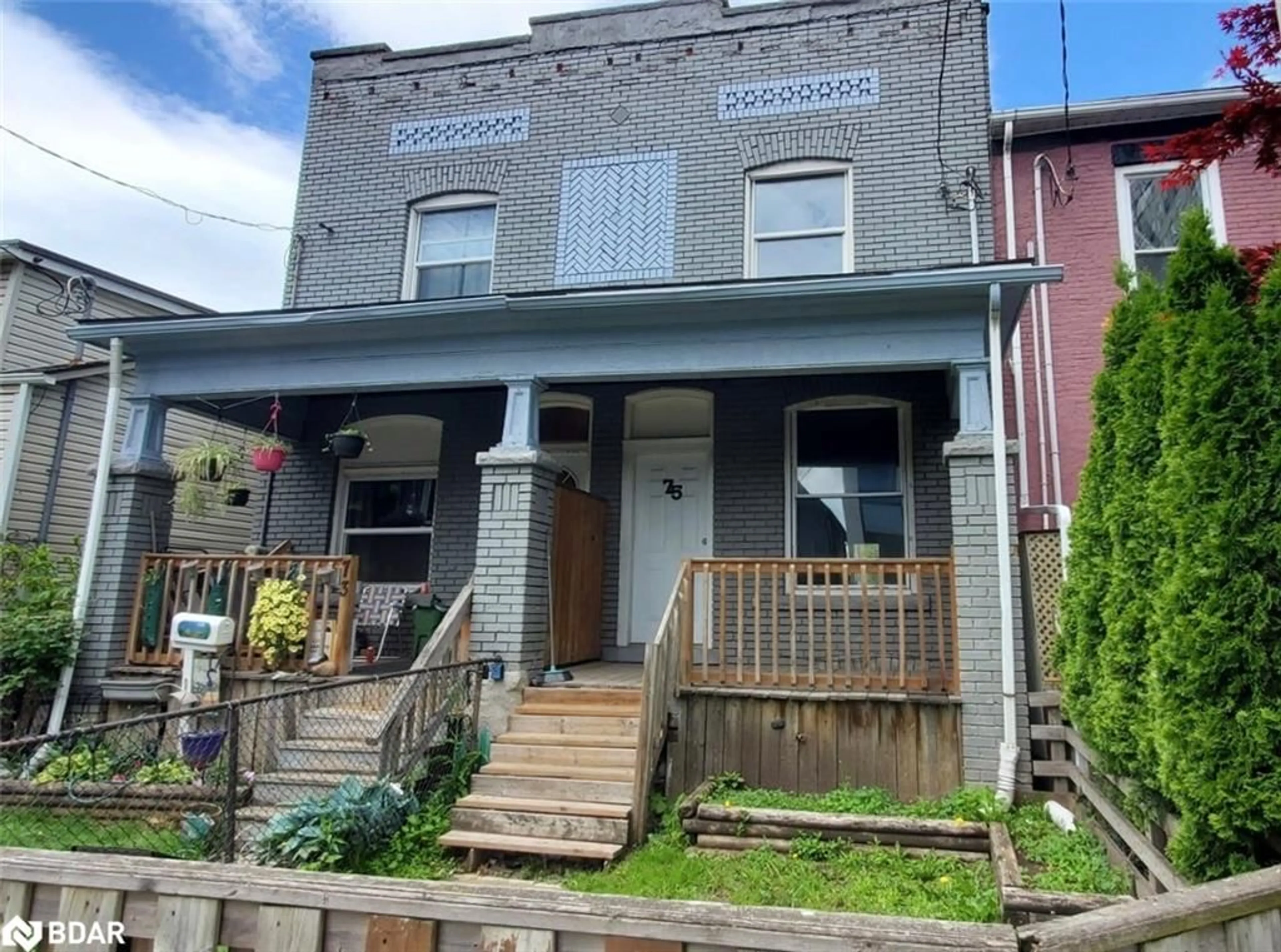 Home with brick exterior material, street for 73-75 Cathcart St, Hamilton Ontario L8R 1M6