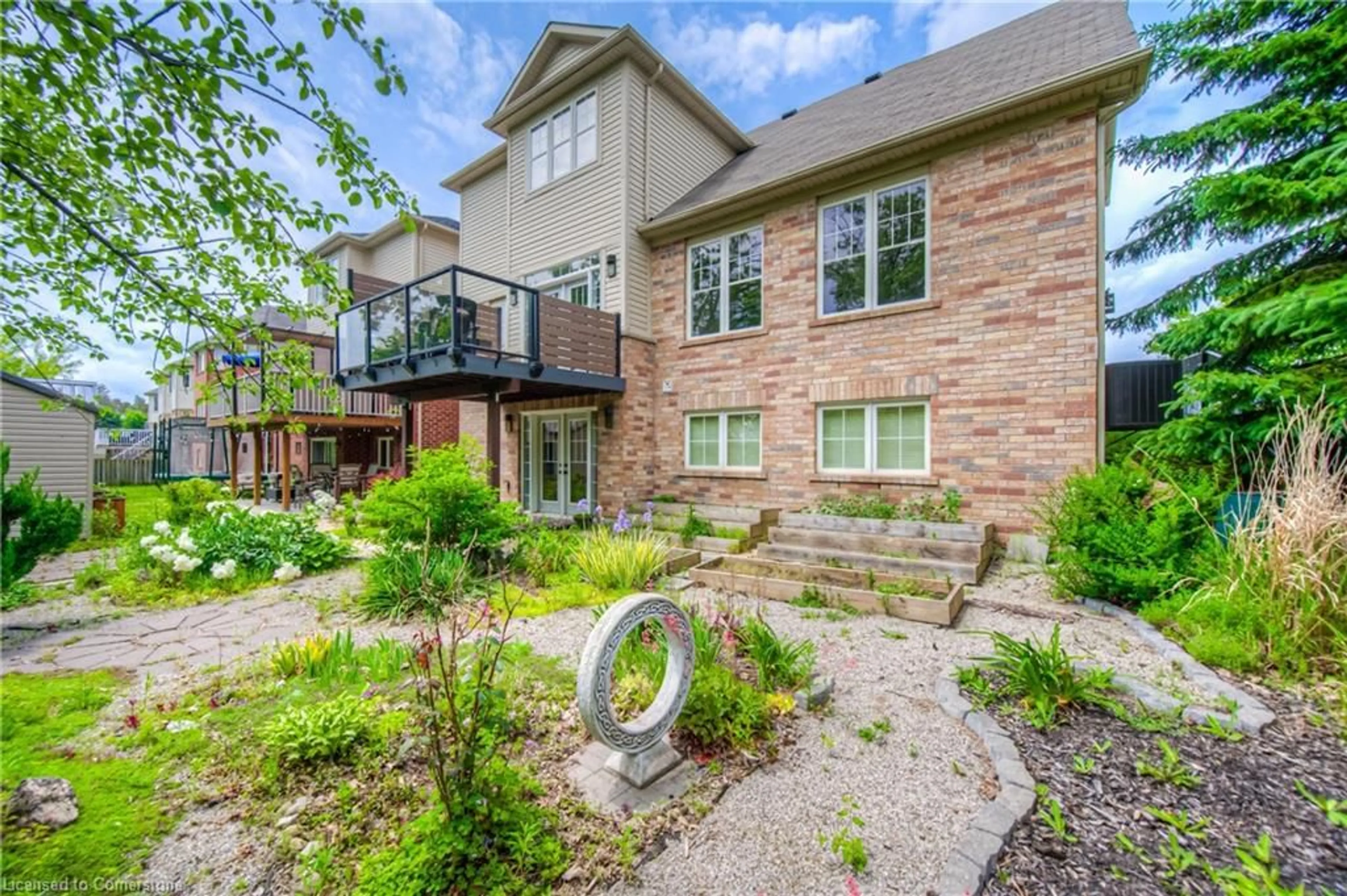 Home with brick exterior material, street for 114 Baldwin Dr, Cambridge Ontario N3C 0B4