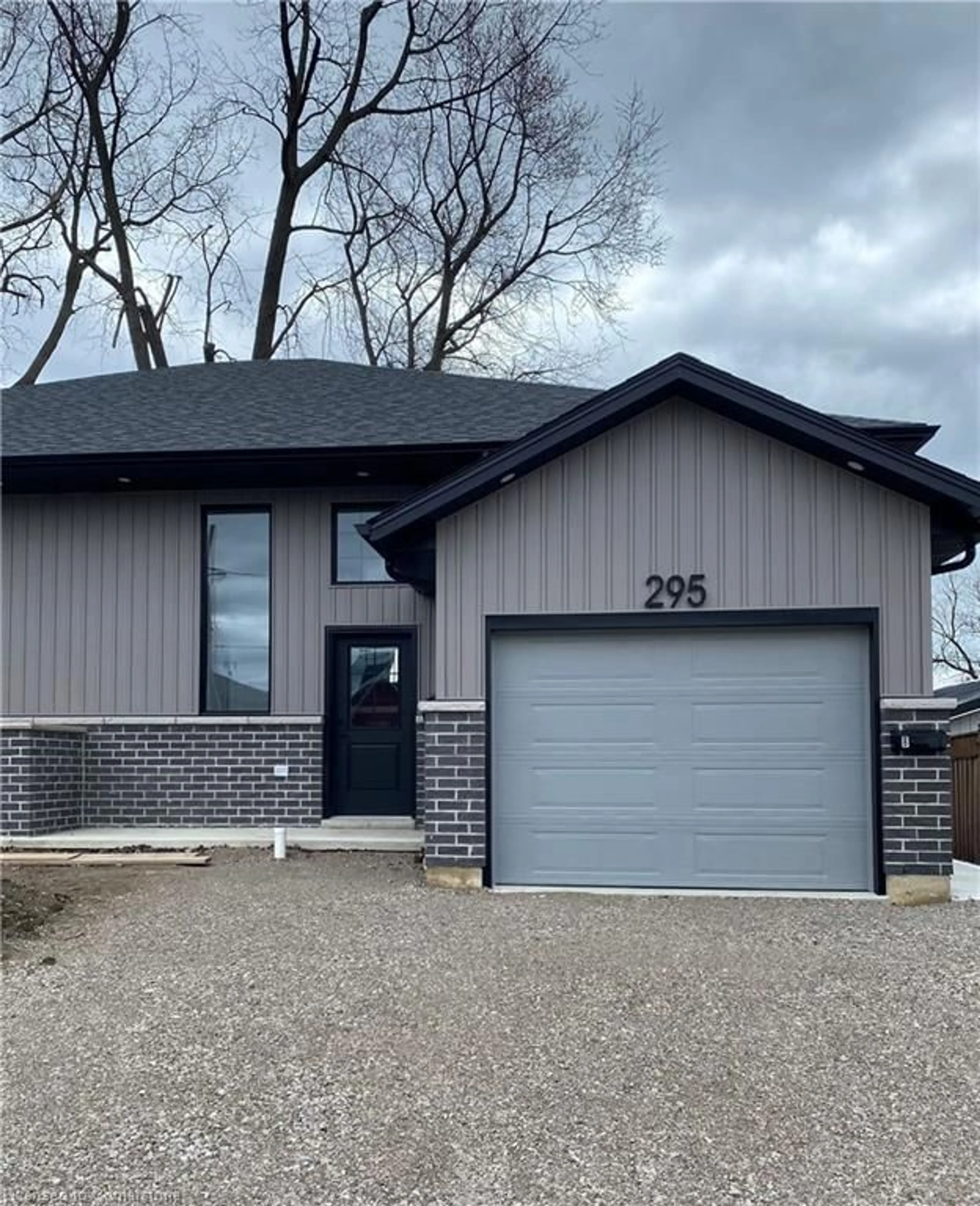 Home with brick exterior material, street for 295-297 Glass Ave, Kingsville Ontario N9Y 1M1