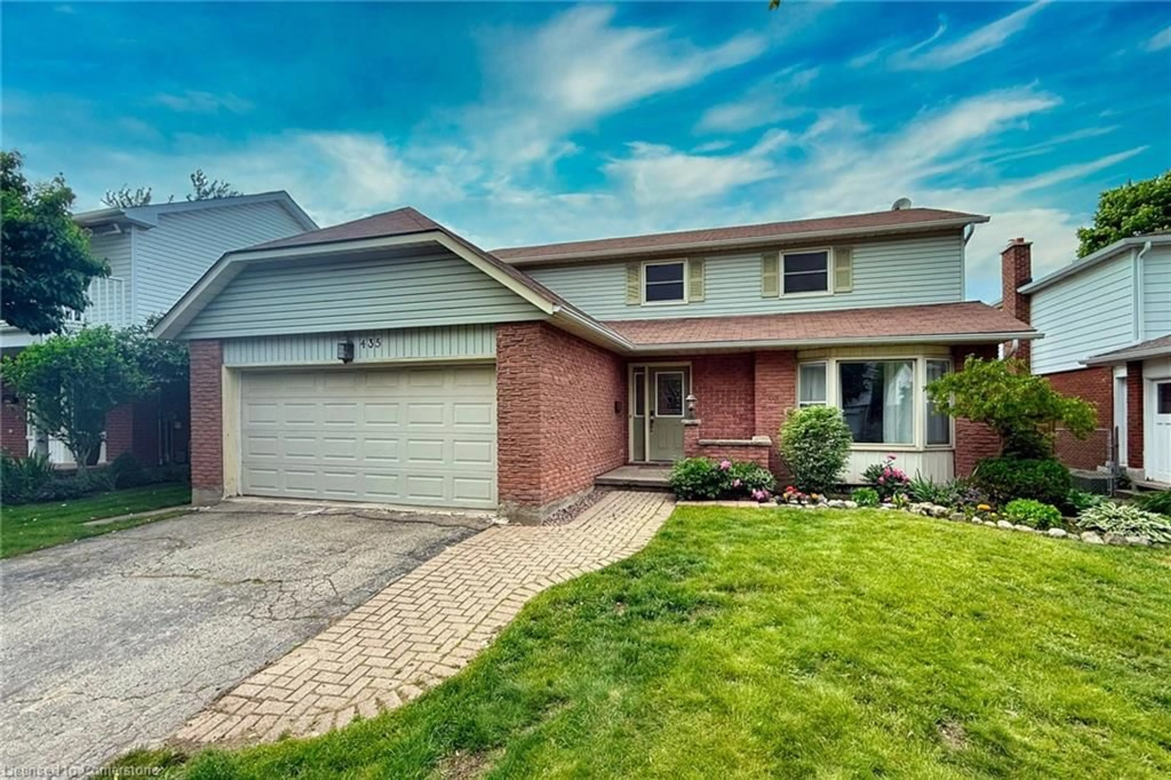Home with brick exterior material, street for 435 Stillmeadow Cir, Waterloo Ontario N2L 5M1