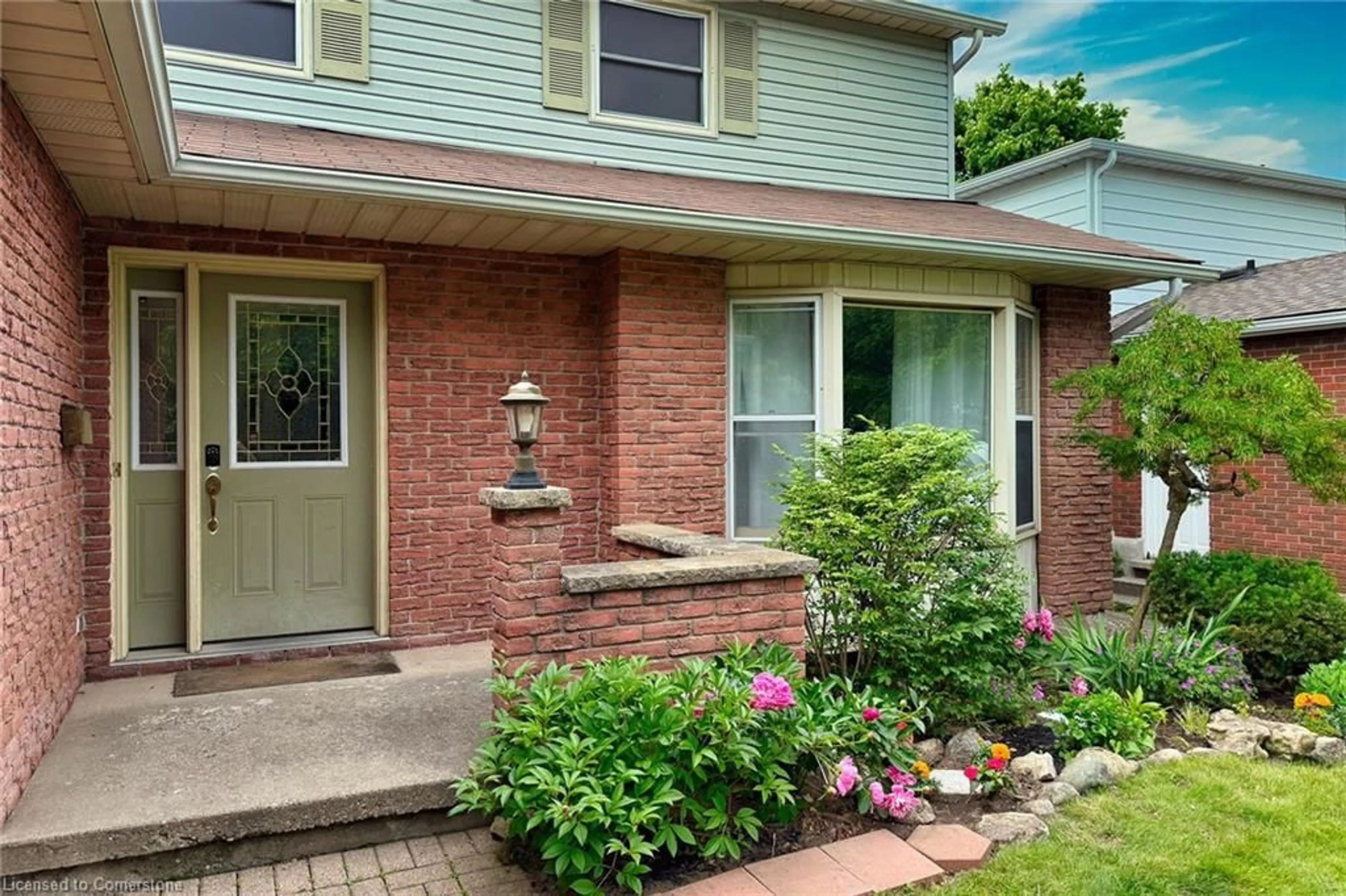 Home with brick exterior material, street for 435 Stillmeadow Cir, Waterloo Ontario N2L 5M1