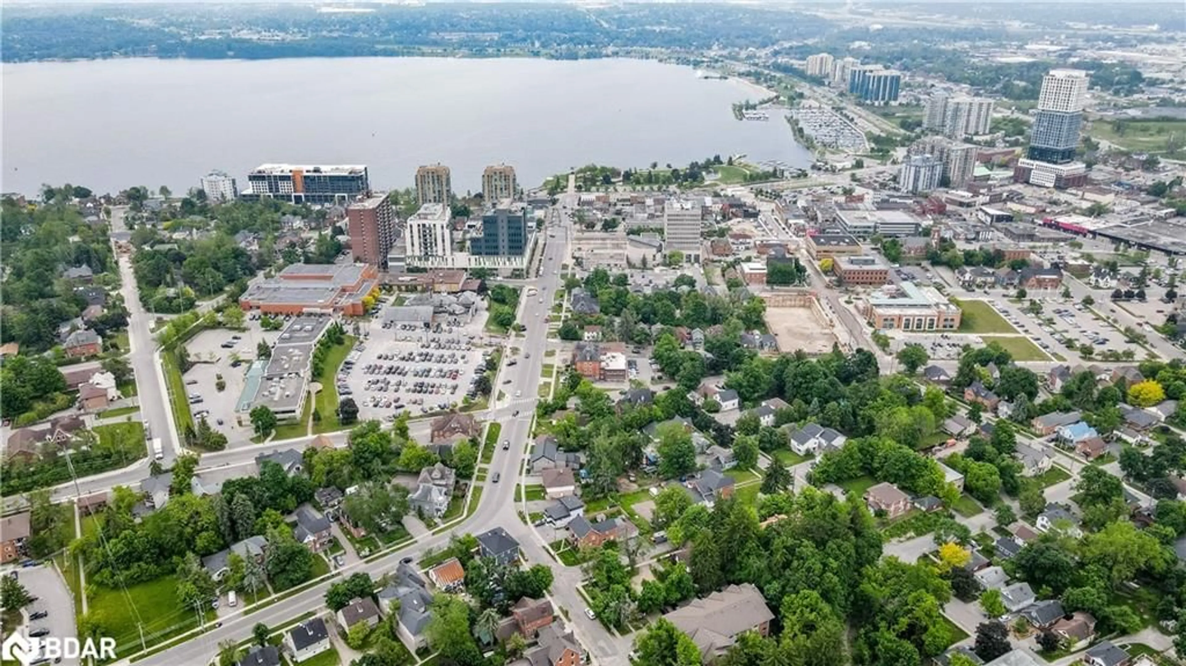 A pic from outside/outdoor area/front of a property/back of a property/a pic from drone, water/lake/river/ocean view for 121 Mulcaster St, Barrie Ontario L4M 3M8
